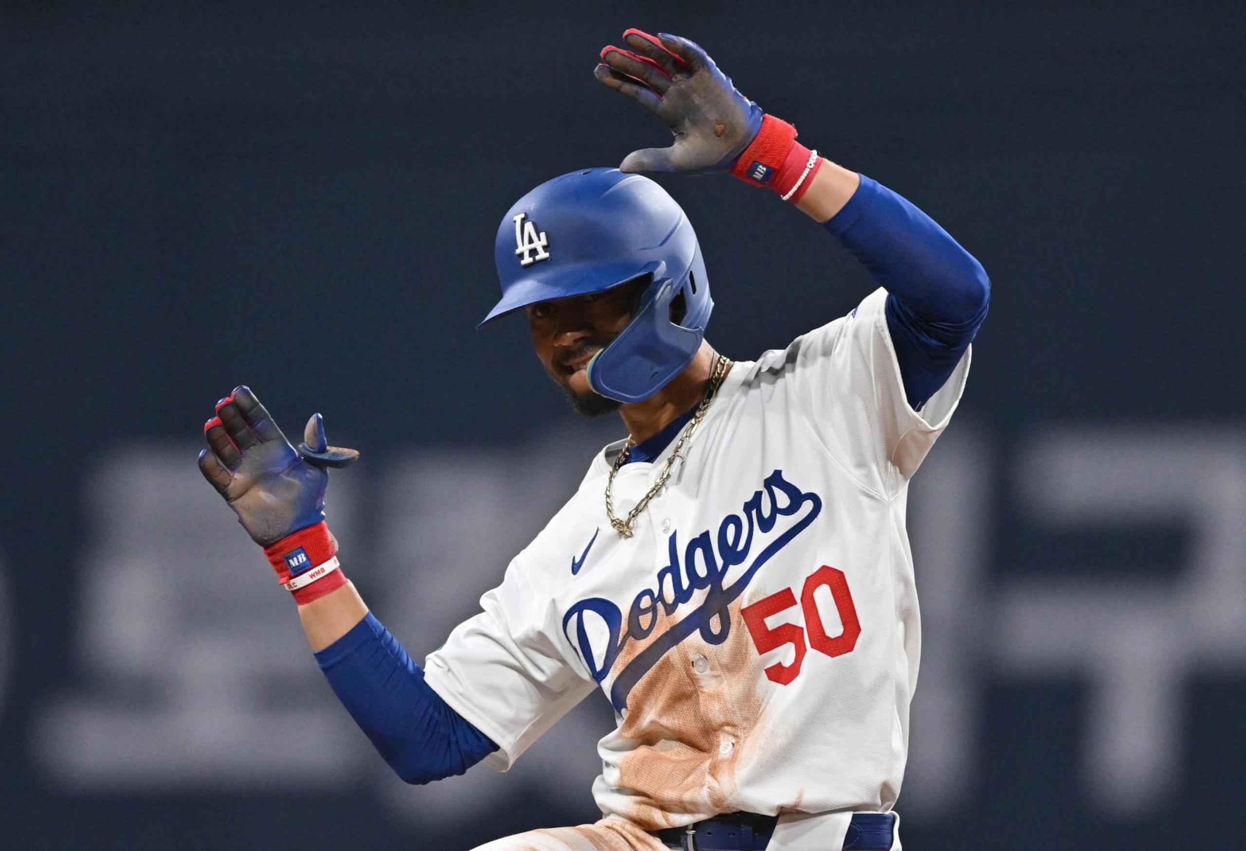 Los Angeles Dodgers' Mookie Betts celebrates after hitting two RBI double in the eighth inning of the 2024 MLB Seoul Series baseball game 2 between Los Angeles Dodgers and San Diego Padres at the Gocheok Sky Dome in Seoul on March 21, 2024. (Photo by Jung Yeon-je / AFP) (Photo by JUNG YEON-JE/AFP via Getty Images) Los Angeles Dodgers' Mookie Betts celebrates after hitting two RBI double in the eighth inning of the 2024 MLB Seoul Series baseball game 2 between Los Angeles Dodgers and San Diego Padres at the Gocheok Sky Dome in Seoul on March 21, 2024. (Photo by Jung Yeon-je / AFP) (Photo by JUNG YEON-JE/AFP via Getty Images)