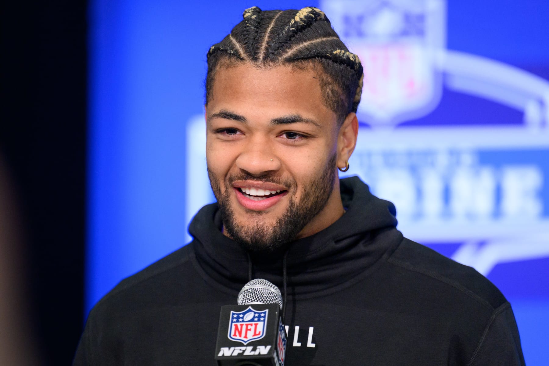 INDIANAPOLIS, IN - MARCH 01: Washington wide receiver Rome Odunze answers questions from the media during the NFL Scouting Combine on March 1, 2024, at the Indiana Convention Center in Indianapolis, IN. (Photo by Zach Bolinger/Icon Sportswire via Getty Images)