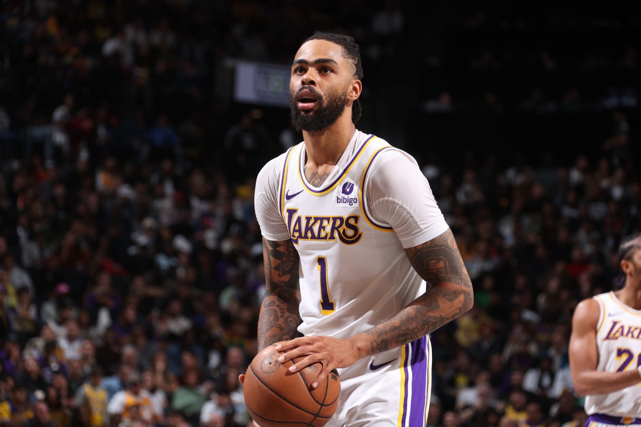 BROOKLYN, NY - MARCH 31: D'Angelo Russell #1 of the Los Angeles Lakers shoots a free throw during the game on March 31, 2024 at Barclays Center in Brooklyn, New York. NOTE TO USER: User expressly acknowledges and agrees that, by downloading and or using this Photograph, user is consenting to the terms and conditions of the Getty Images License Agreement. Mandatory Copyright Notice: Copyright 2024 NBAE (Photo by Nathaniel S. Butler/NBAE via Getty Images)