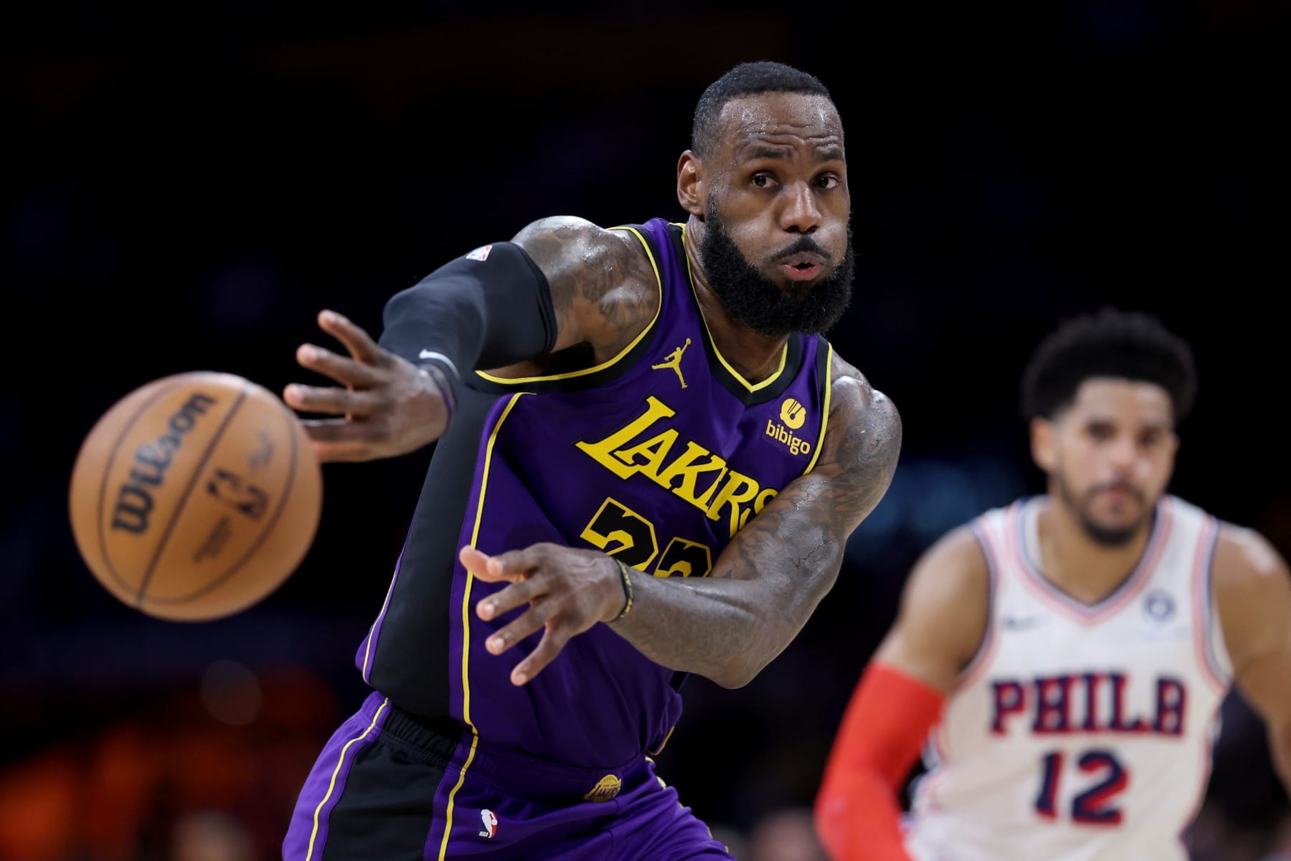LOS ANGELES, CALIFORNIA - MARCH 22: LeBron James #23 of the Los Angeles Lakers passes the ball during the second half of a game against the Philadelphia 76ers at Crypto.com Arena on March 22, 2024 in Los Angeles, California. NOTE TO USER: User expressly acknowledges and agrees that, by downloading and/or using this photograph, user is consenting to the terms and conditions of the Getty Images License Agreement. (Photo by Sean M. Haffey/Getty Images) LOS ANGELES, CALIFORNIA - MARCH 22: LeBron James #23 of the Los Angeles Lakers passes the ball during the second half of a game against the Philadelphia 76ers at Crypto.com Arena on March 22, 2024 in Los Angeles, California. NOTE TO USER: User expressly acknowledges and agrees that, by downloading and/or using this photograph, user is consenting to the terms and conditions of the Getty Images License Agreement. (Photo by Sean M. Haffey/Getty Images)