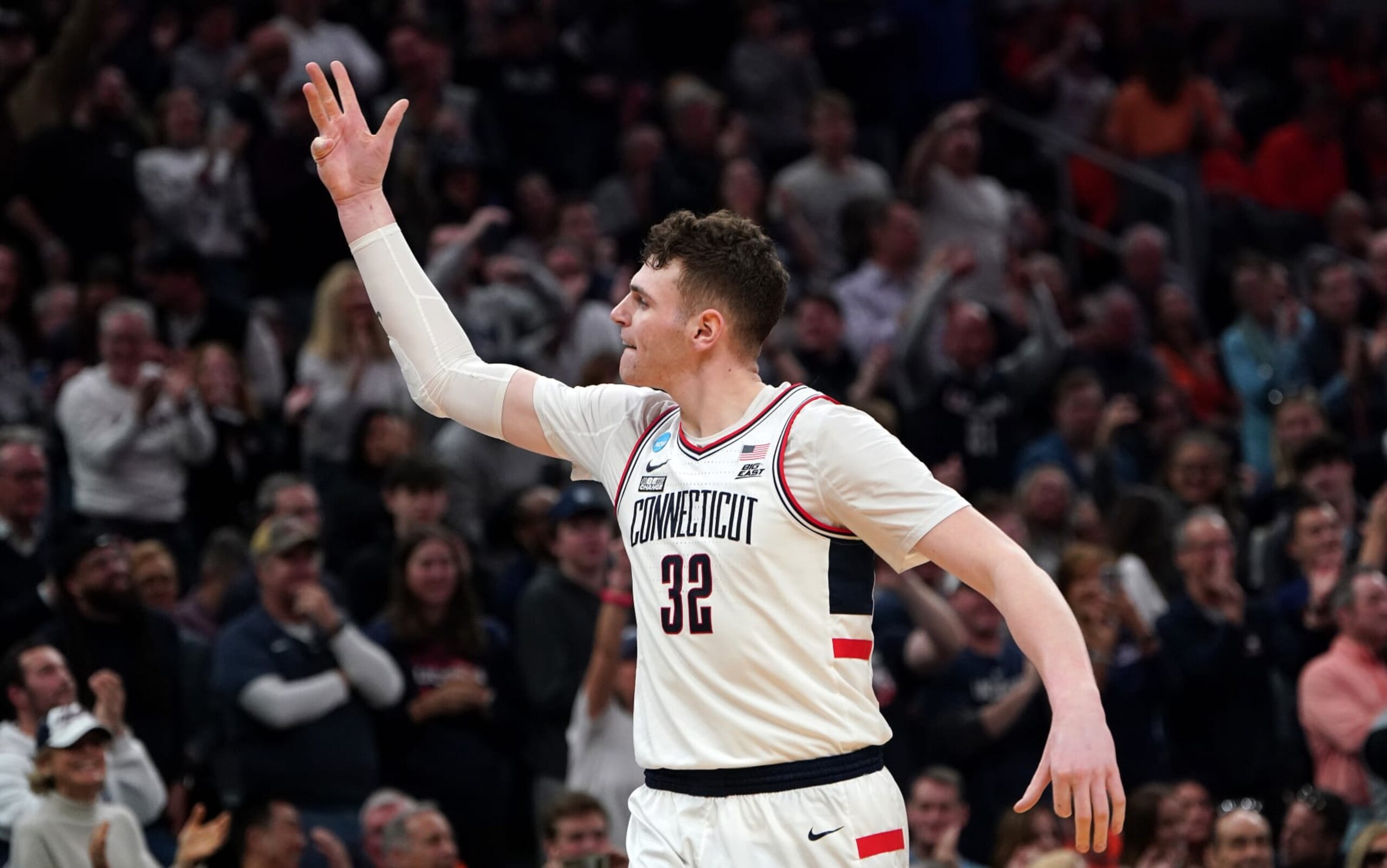 Boston, MA - March 30: UConn center Donovan Clingan celebrates after guard Cam Spencer, not pictured, drained a 3-pointer during the second half. UConn beat Illinois at TD Garden in the NCAA East Regional Final. (Photo by Barry Chin/The Boston Globe via Getty Images) Boston, MA - March 30: UConn center Donovan Clingan celebrates after guard Cam Spencer, not pictured, drained a 3-pointer during the second half. UConn beat Illinois at TD Garden in the NCAA East Regional Final. (Photo by Barry Chin/The Boston Globe via Getty Images)