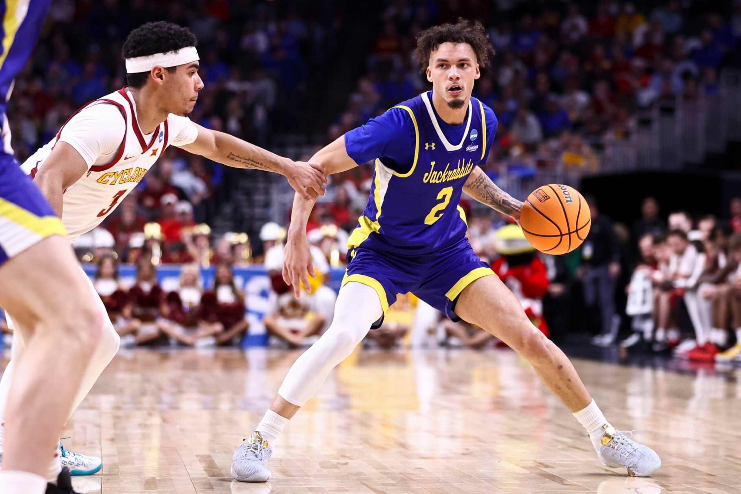 OMAHA, NEBRASKA - MARCH 21: Zeke Mayo #2 of the South Dakota State Jackrabbits dribbles the ball during the second half against the Iowa State Cyclones during the first round of the 2024 NCAA Men's Basketball Tournament held at CHI Health Center on March 21, 2024 in Omaha, Nebraska. (Photo by Tyler Schank/NCAA Photos via Getty Images) OMAHA, NEBRASKA - MARCH 21: Zeke Mayo #2 of the South Dakota State Jackrabbits dribbles the ball during the second half against the Iowa State Cyclones during the first round of the 2024 NCAA Men's Basketball Tournament held at CHI Health Center on March 21, 2024 in Omaha, Nebraska. (Photo by Tyler Schank/NCAA Photos via Getty Images)