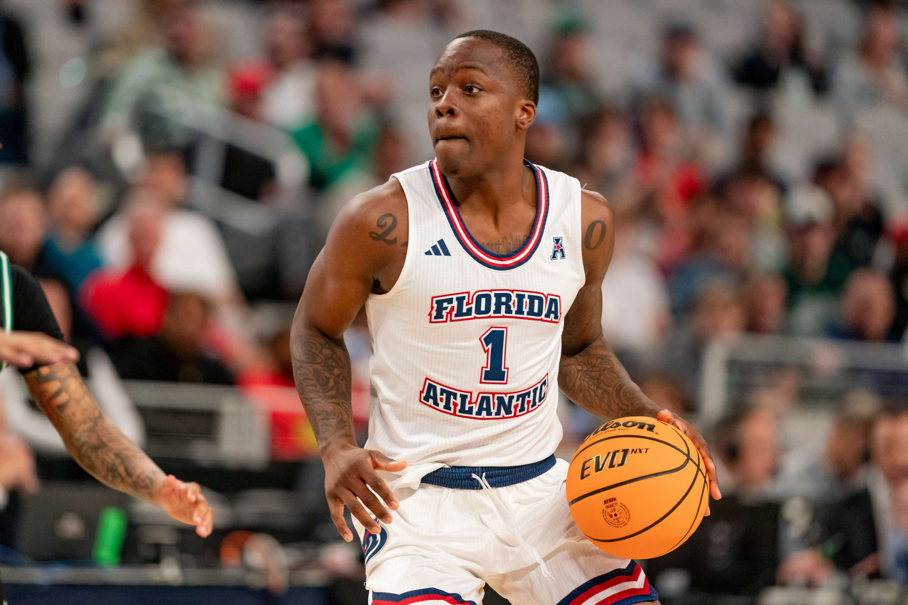 FORT WORTH, TX - MARCH 15: Florida Atlantic Owls guard Johnell Davis (1) dribbles during the American Athletic Conference Championship tournament game between the North Texas Mean Green and Florida Atlantic Owls on March 15, 2024 at Dickies Arena in Fort Worth, Texas. (Photo by Chris Leduc/Icon Sportswire via Getty Images)