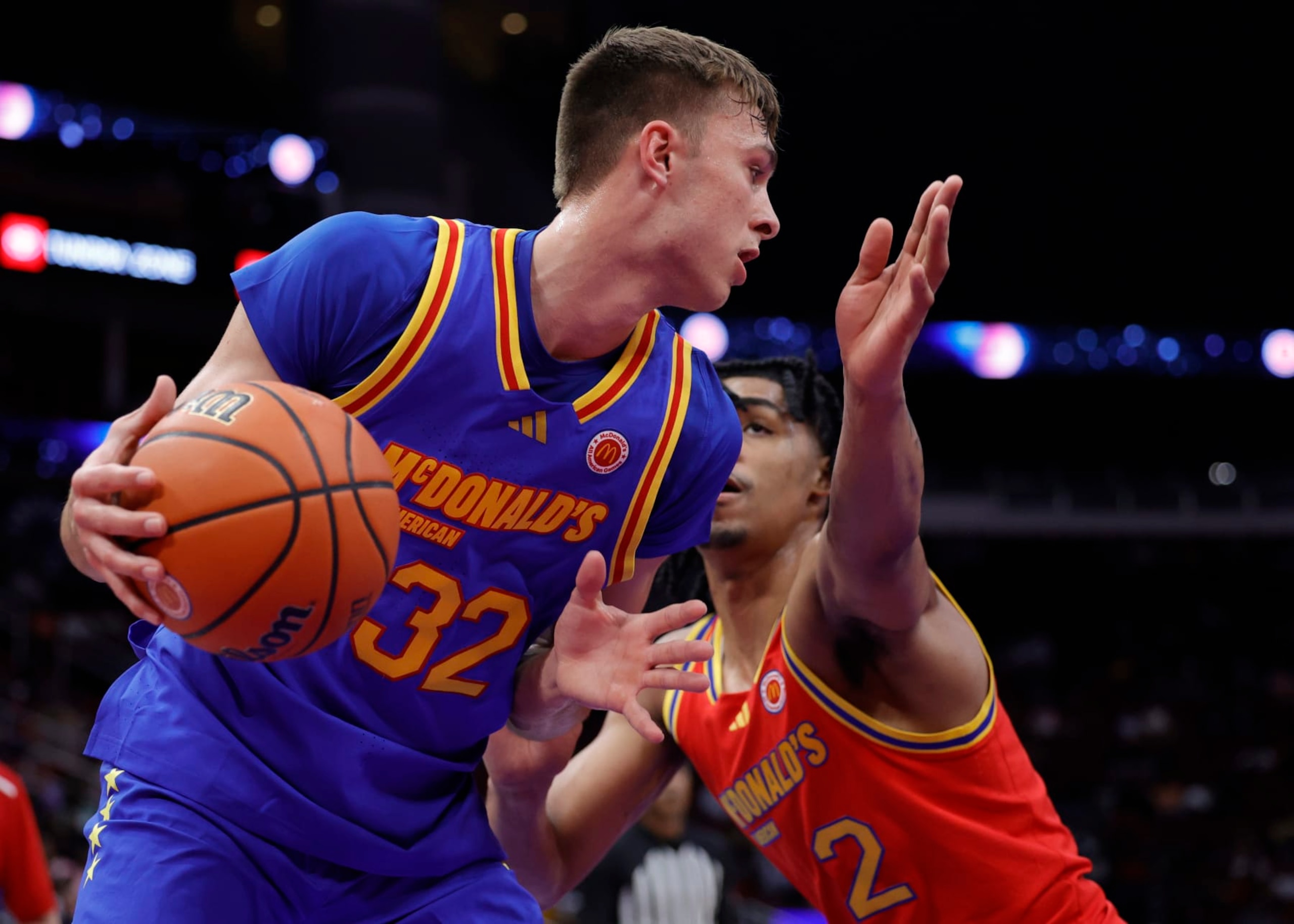 HOUSTON, TEXAS - APRIL 02: Cooper Flagg  #32 controls the ball ahead of Dylan Harper #2  during the first half of the mens 2024 McDonald's All American Game at Toyota Center on April 02, 2024 in Houston, Texas.  (Photo by Carmen Mandato/Getty Images)
