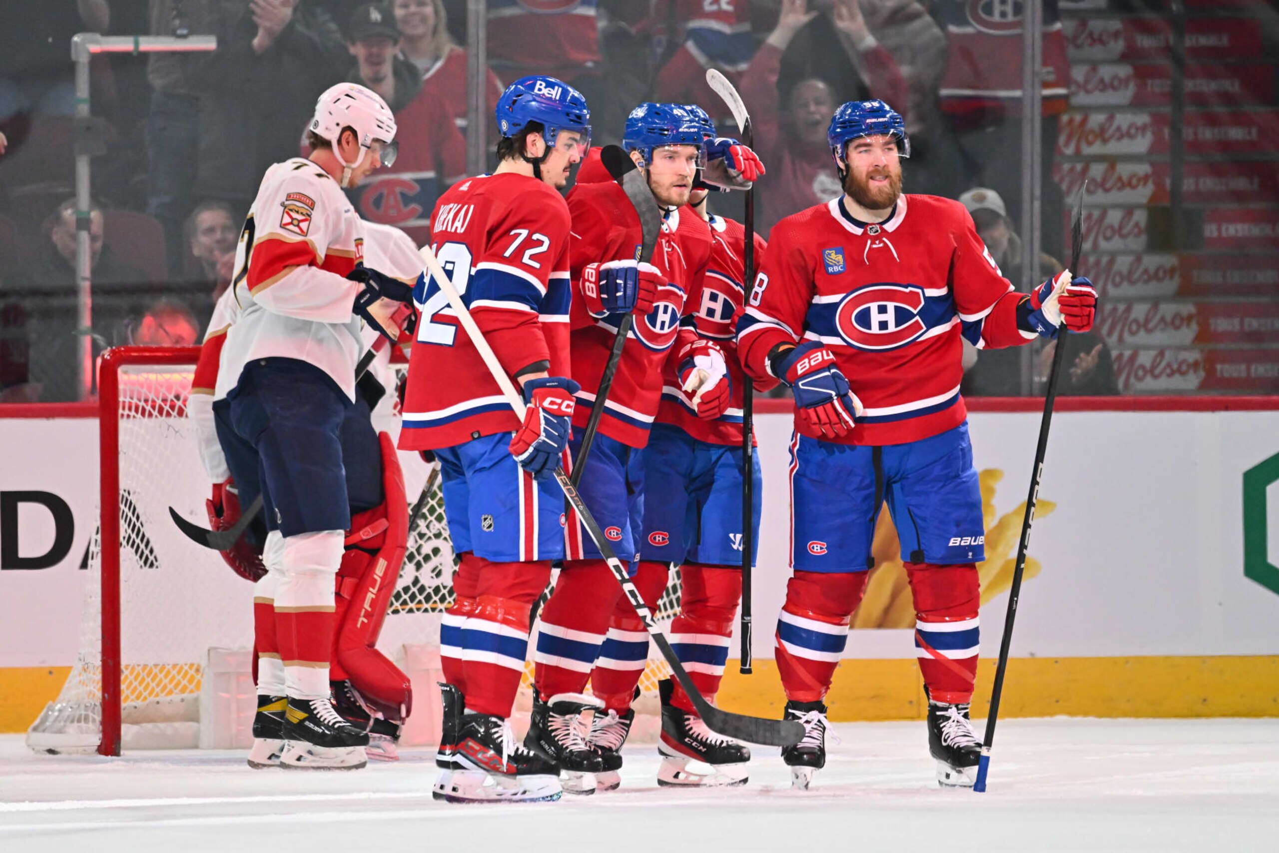MONTREAL, CANADA - APRIL 02:  Joel Armia #40 of the Montreal Canadiens celebrates his goal with teammates Arber Xhekaj #72 and David Savard #58 during the first period against the Florida Panthers at the Bell Centre on April 2, 2024 in Montreal, Quebec, Canada.  (Photo by Minas Panagiotakis/Getty Images)