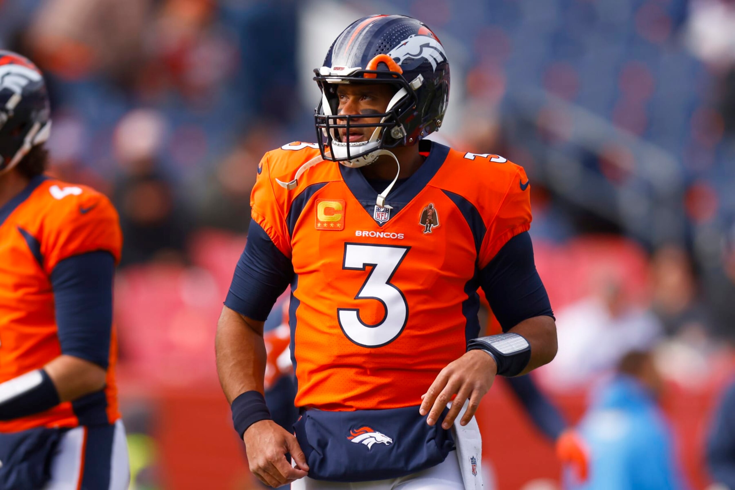 DENVER, COLORADO - DECEMBER 31: Russell Wilson #3 of the Denver Broncos warms up prior to a game against the Los Angeles Chargers at Empower Field At Mile High on December 31, 2023 in Denver, Colorado. (Photo by Justin Edmonds/Getty Images)