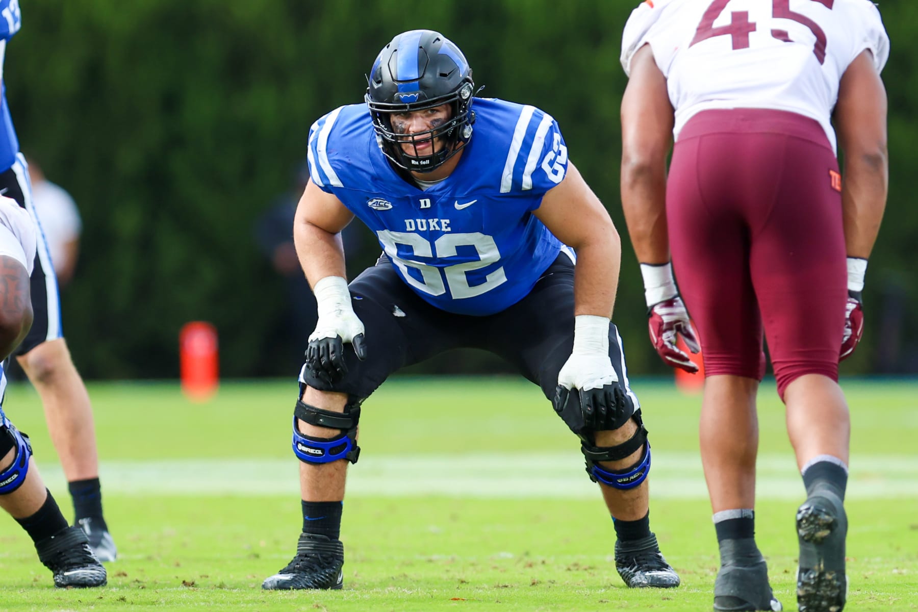 DURHAM, NC - NOVEMBER 12: Graham Barton (62) of the Duke Blue Devils gets set on the line during a football game between the Duke Blue Devils and the Virginia Tech Hokies on Nov 12, 2022 at Wallace Wade Stadium in Durham, NC. (Photo by David Jensen/Icon Sportswire via Getty Images) DURHAM, NC - NOVEMBER 12: Graham Barton (62) of the Duke Blue Devils gets set on the line during a football game between the Duke Blue Devils and the Virginia Tech Hokies on Nov 12, 2022 at Wallace Wade Stadium in Durham, NC. (Photo by David Jensen/Icon Sportswire via Getty Images)
