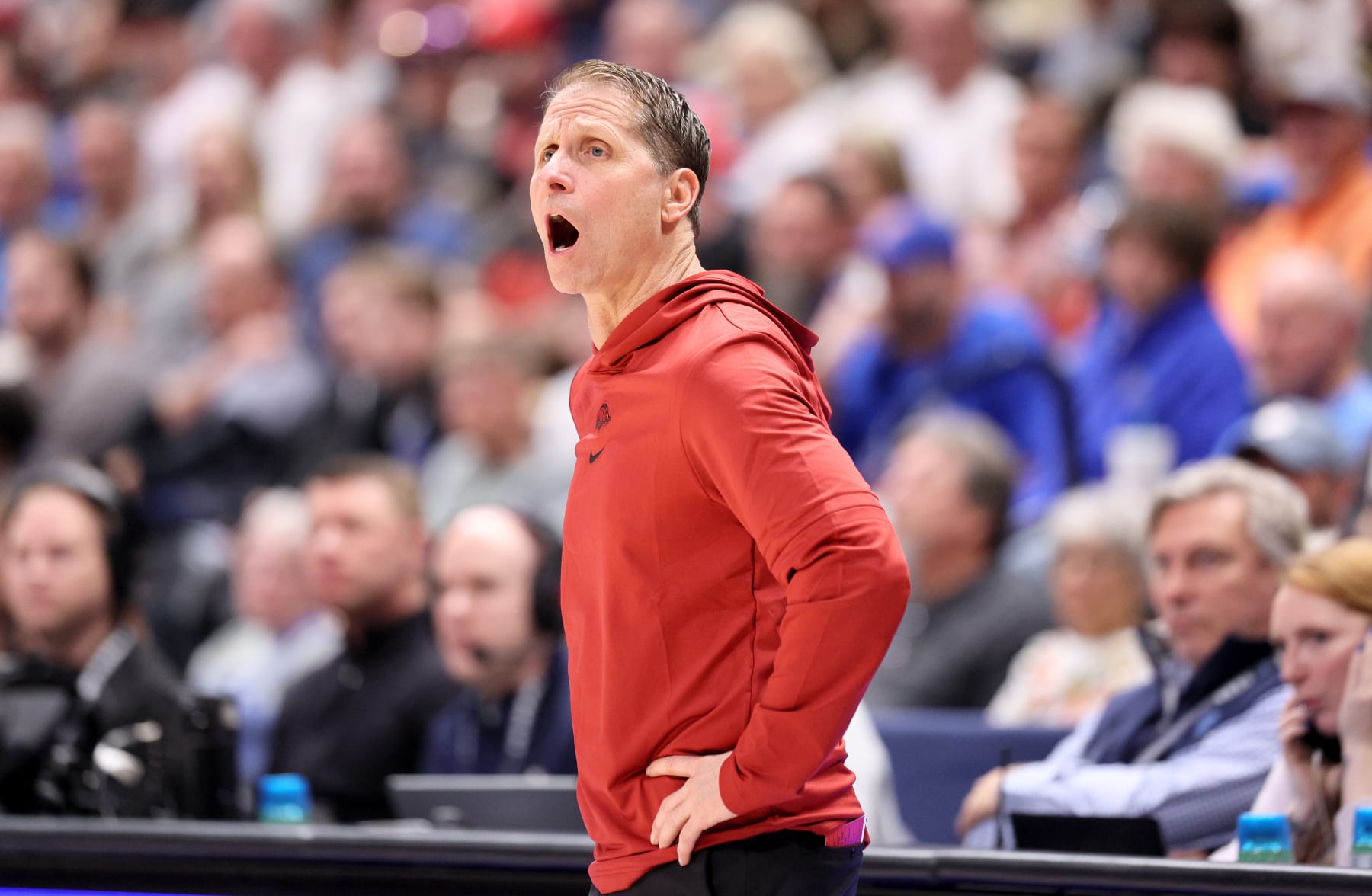 NASHVILLE, TENNESSEE - MARCH 13:  Eric Musselman the head coach  of the Arkansas Razorbacks gives instructions to his team against the Vanderbilt Commodores during the first round of the SEC Basketball Tournament at Bridgestone Arena on March 13, 2024 in Nashville, Tennessee. (Photo by Andy Lyons/Getty Images)