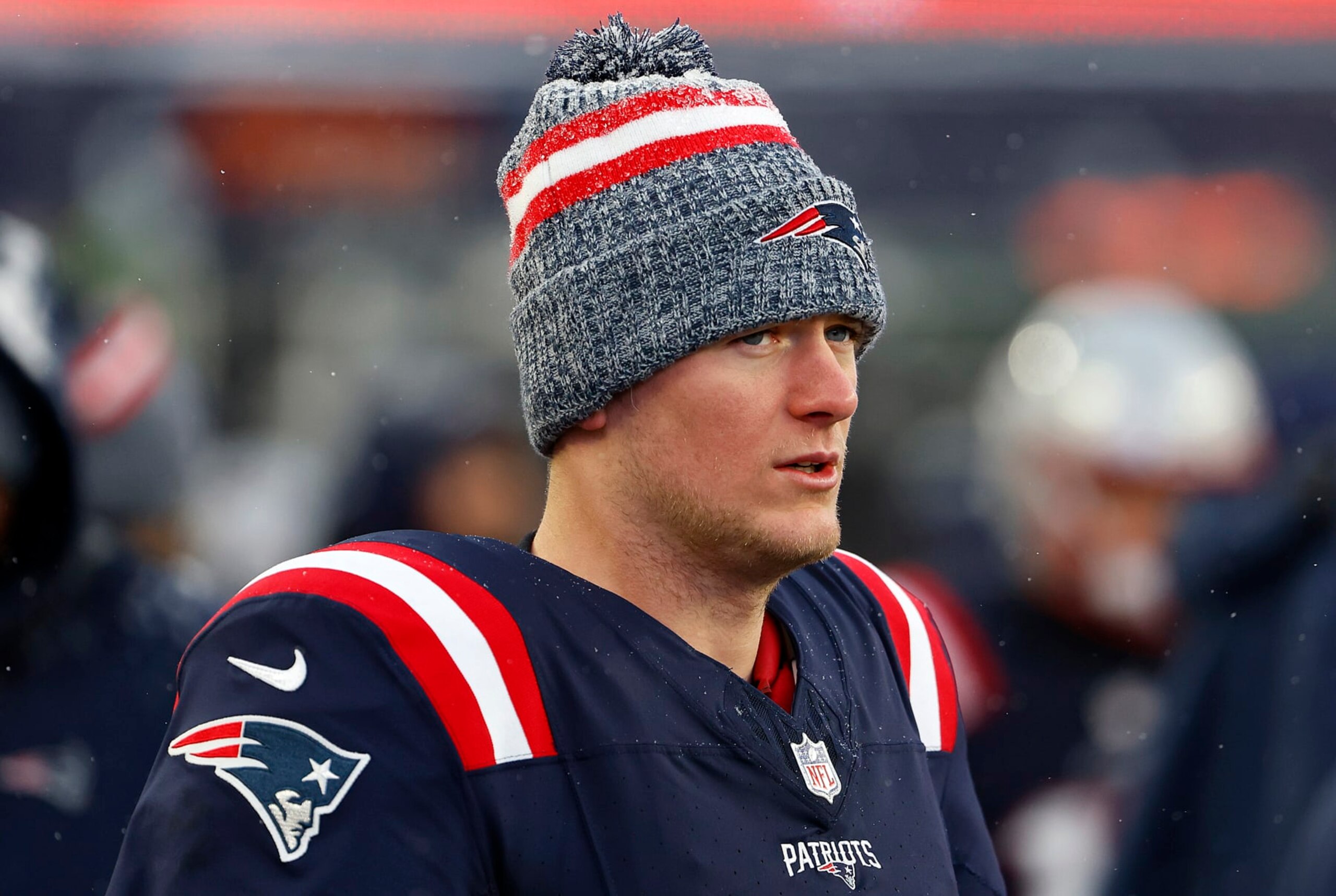 FOXBOROUGH, MASSACHUSETTS - JANUARY 07: Mac Jones #10 of the New England Patriots looks on after a game against the New York Jets at Gillette Stadium on January 07, 2024 in Foxborough, Massachusetts. (Photo by Winslow Townson/Getty Images) FOXBOROUGH, MASSACHUSETTS - JANUARY 07: Mac Jones #10 of the New England Patriots looks on after a game against the New York Jets at Gillette Stadium on January 07, 2024 in Foxborough, Massachusetts. (Photo by Winslow Townson/Getty Images)