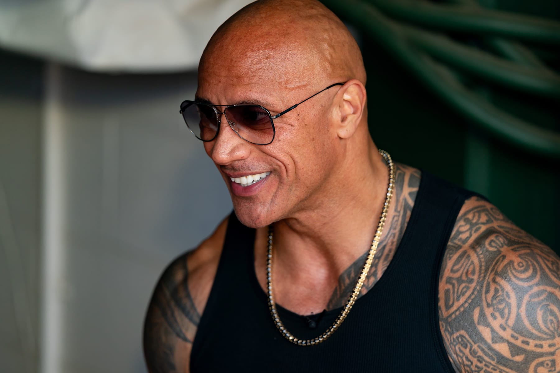 ARLINGTON, TX - MARCH 30: UFL Owner Dwayne Johnson (The Rock) smiles during a UFL game between the Birmingham Stallions and the Arlington Renegades on March 30, 2024 at Choctaw Stadium in Arlington, TX. (Photo by Chris Leduc/Icon Sportswire via Getty Images)