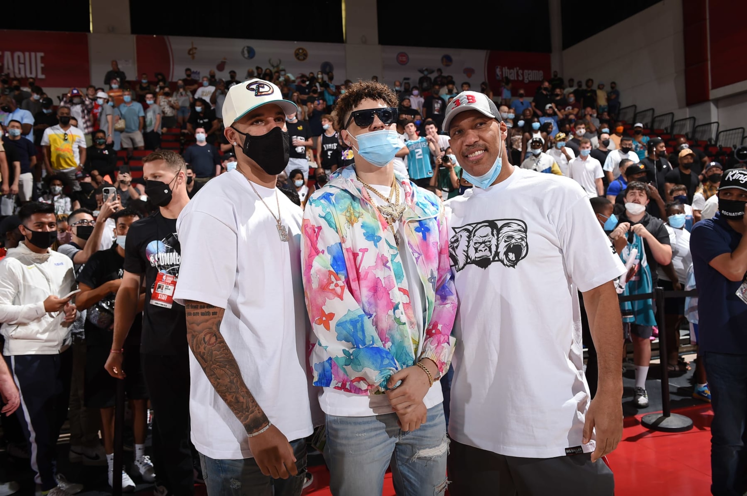 LAS VEGAS, NV - AUGUST 12: Lonzo Ball of the Chicago Bulls, LaMelo Ball #2 of the Charlotte Hornets poses for a photo with their father, LaVar Ball during the 2021 Las Vegas Summer League on August 12, 2021 at the Cox Pavilion in Las Vegas, Nevada. NOTE TO USER: User expressly acknowledges and agrees that, by downloading and/or using this Photograph, user is consenting to the terms and conditions of the Getty Images License Agreement. Mandatory Copyright Notice: Copyright 2021 NBAE (Photo by David Dow/NBAE via Getty Images)