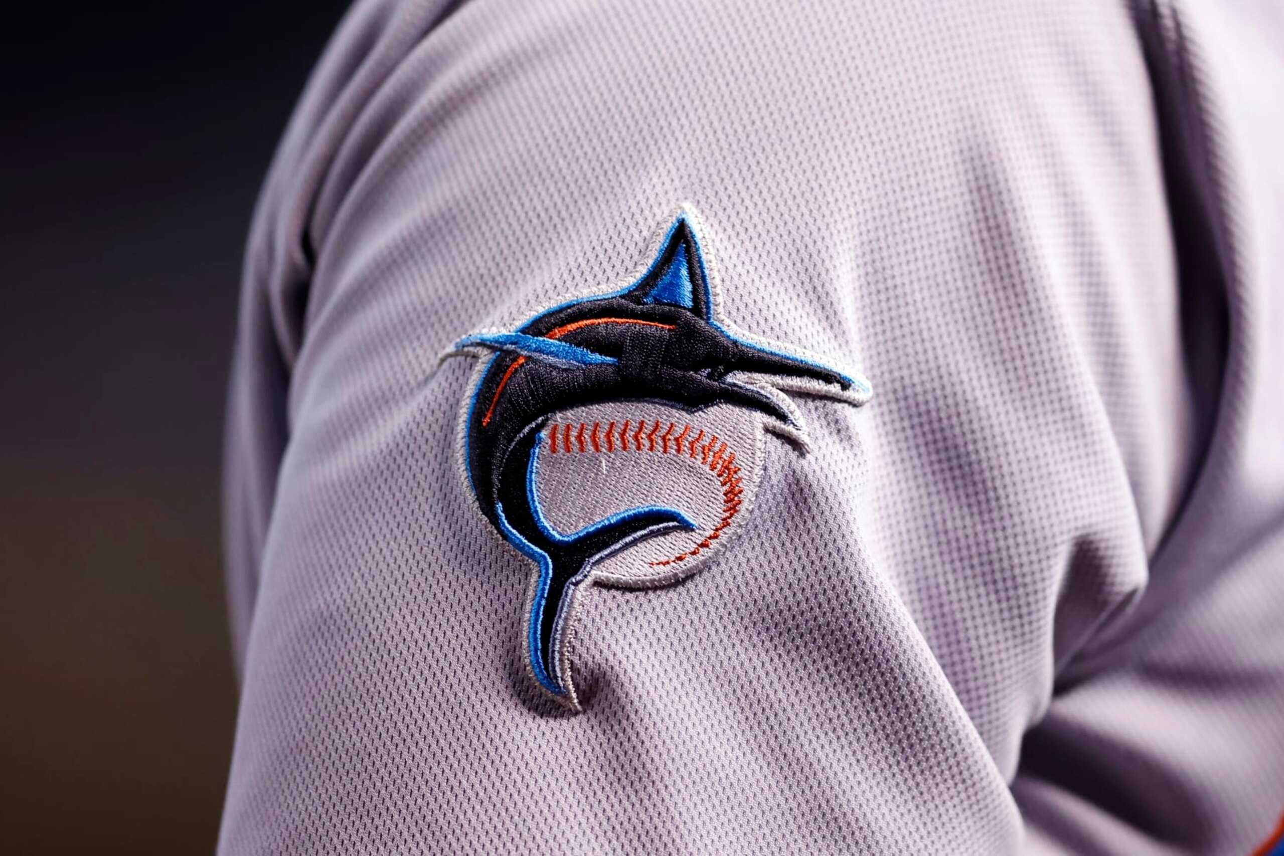 PHOENIX, ARIZONA - MAY 10: A close up of the Miami Marlins logo patch on a uniform during the game against the Arizona Diamondbacks at Chase Field on May 10, 2023 in Phoenix, Arizona. The Marlins defeated the Diamondbacks 5-4. (Photo by Chris Coduto/Getty Images)