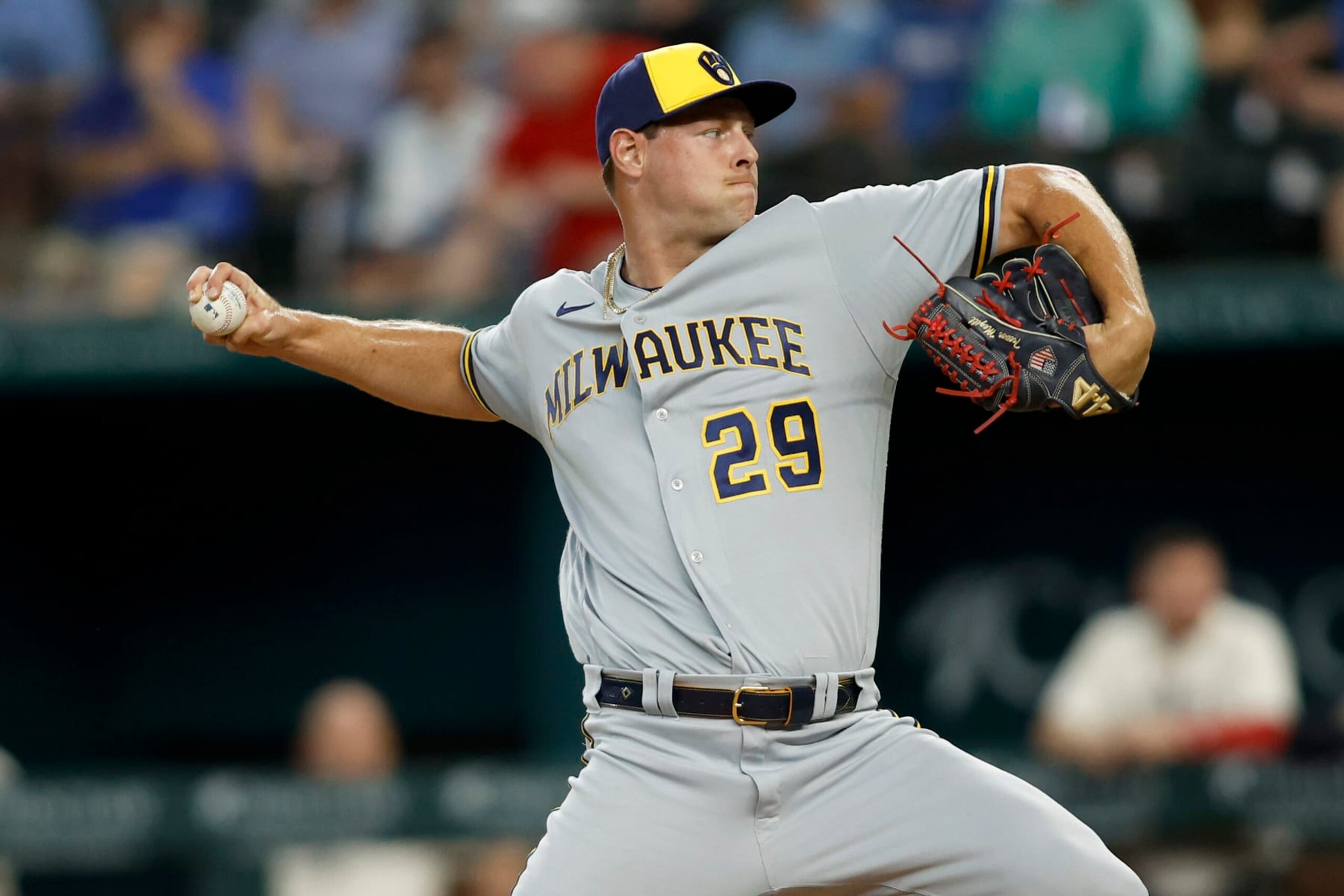 ARLINGTON, TEXAS - AUGUST 19: Trevor Megill #29 of the Milwaukee Brewers throws a pitch in the ninth inning against the Texas Rangers at Globe Life Field on August 19, 2023 in Arlington, Texas. (Photo by Tim Heitman/Getty Images)