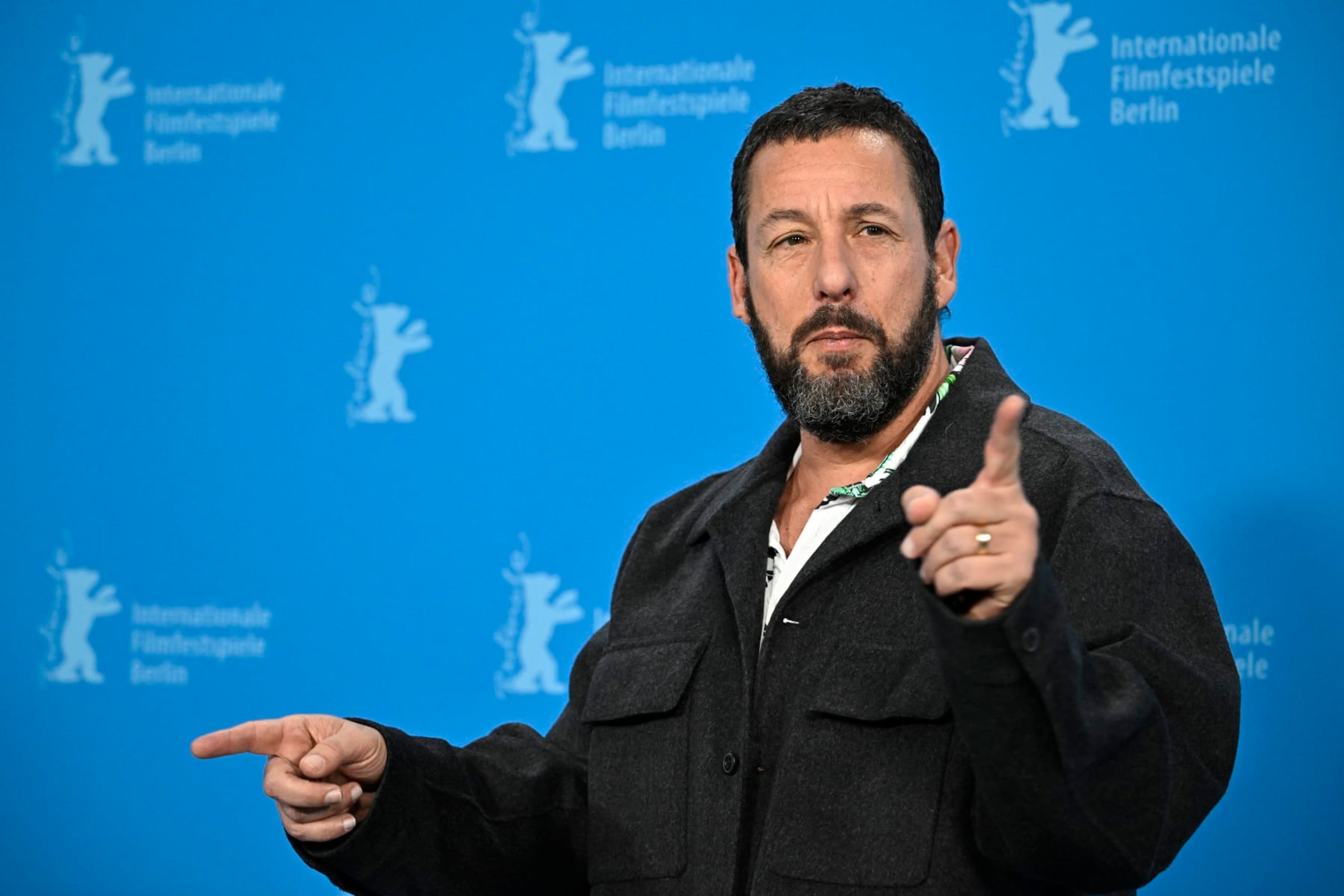US actor Adam Sandler poses during a photo call for the film 'Spaceman' presented in the Berlinale Special Gala at the 74th Berlinale, Europe's first major film festival of the year, in Berlin on February 21, 2024. (Photo by Tobias SCHWARZ / AFP) (Photo by TOBIAS SCHWARZ/AFP via Getty Images)