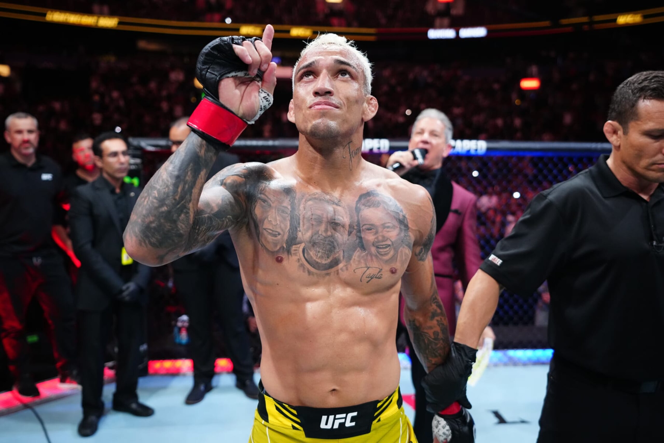 Charles Oliveira celebrates his TKO victory over Beneil Dariush