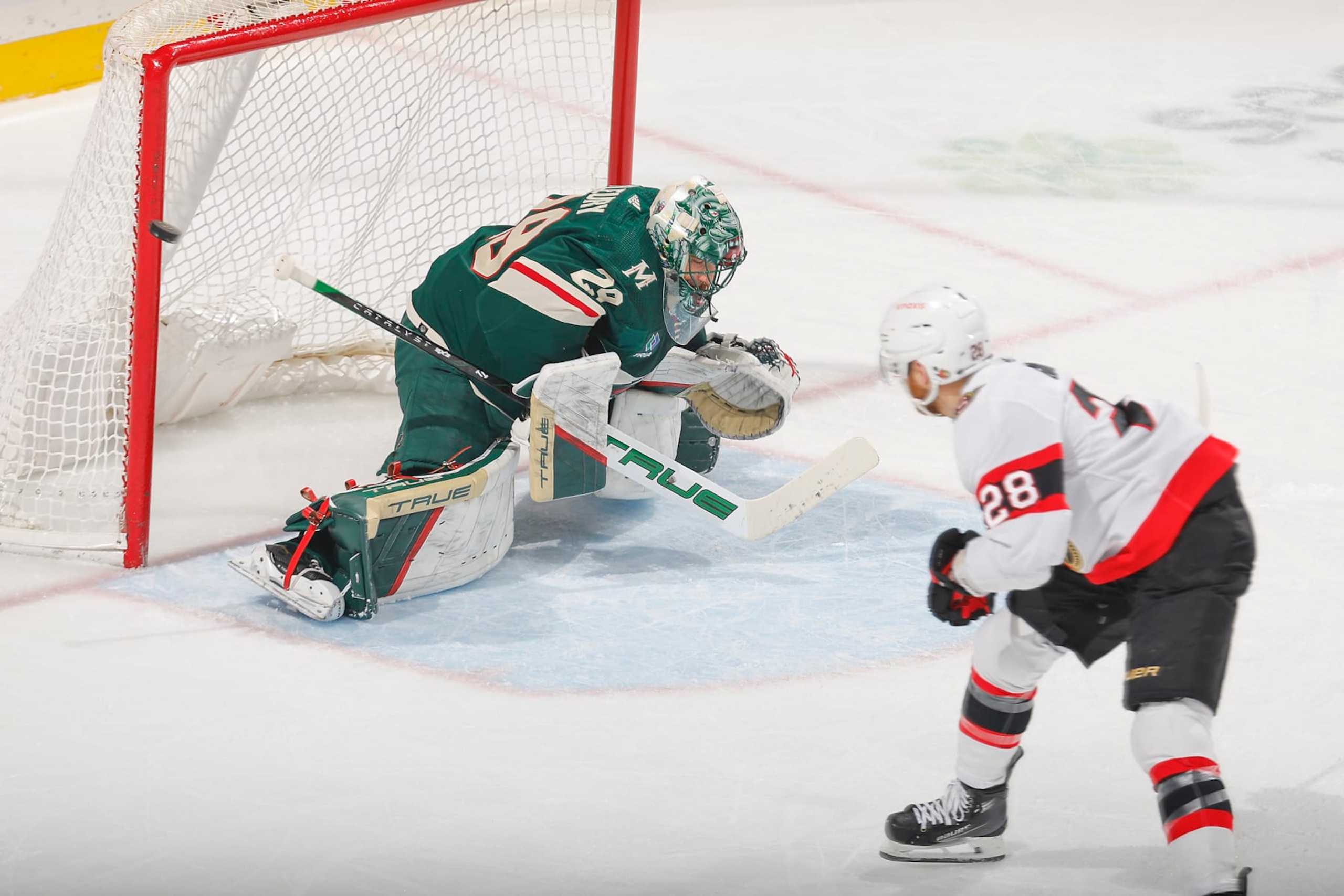 SAINT PAUL, MN - APRIL 2: Marc-Andre Fleury #29 of the Minnesota Wild makes a save against Claude Giroux #28 of the Ottawa Senators during the game at the Xcel Energy Center on April 2, 2024 in Saint Paul, Minnesota. (Photo by Bruce Kluckhohn/NHLI via Getty Images)