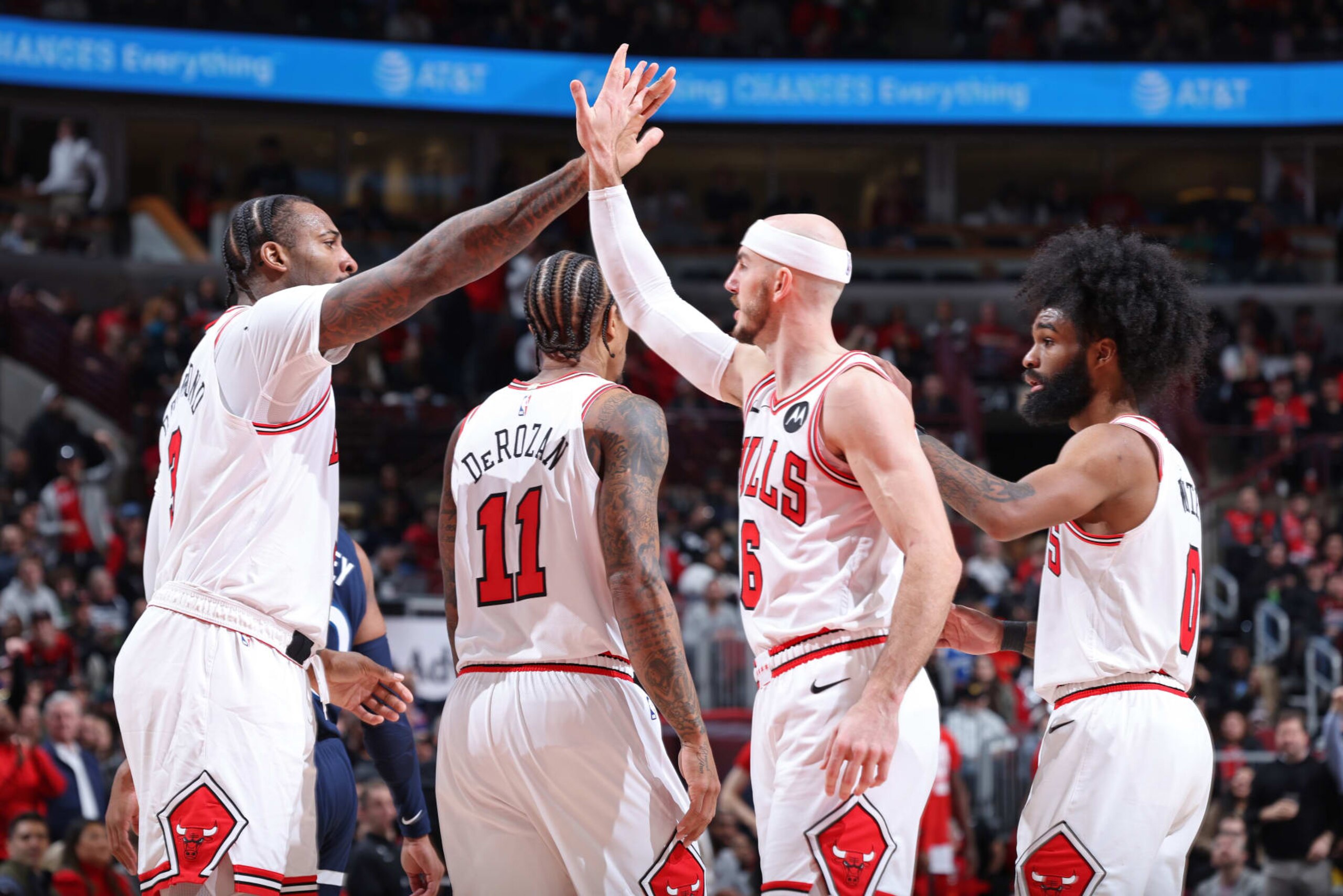 CHICAGO, IL - FEBRUARY 6: Alex Caruso #6 and Andre Drummond #3 of the Chicago Bulls high five during the game against the Minnesota Timberwolves on February 6, 2024 at United Center in Chicago, Illinois. NOTE TO USER: User expressly acknowledges and agrees that, by downloading and or using this photograph, User is consenting to the terms and conditions of the Getty Images License Agreement. Mandatory Copyright Notice: Copyright 2024 NBAE (Photo by Jeff Haynes/NBAE via Getty Images)