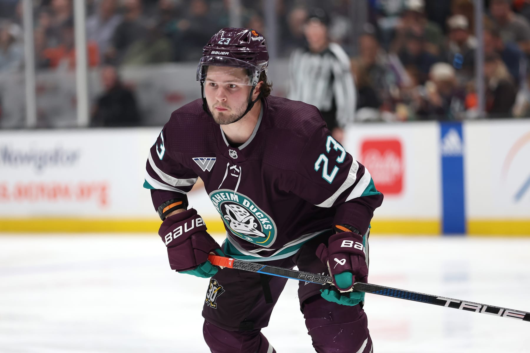 ANAHEIM, CALIFORNIA - MARCH 19: Mason McTavish #23 of the Anaheim Ducks skates to a puck during the second period of a game against the Minnesota Wild at Honda Center on March 19, 2024 in Anaheim, California. (Photo by Sean M. Haffey/Getty Images)