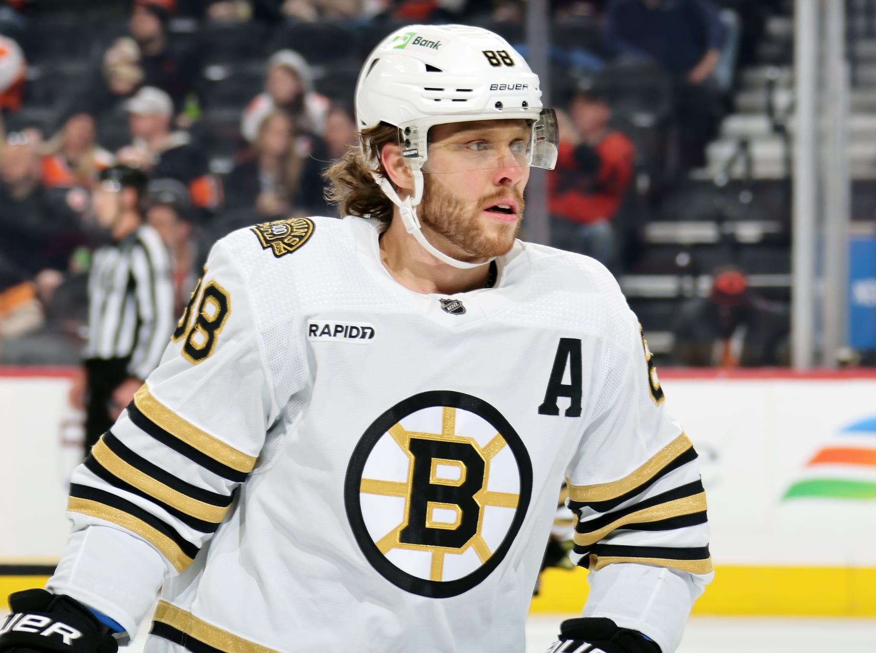 PHILADELPHIA, PENNSYLVANIA - MARCH 23:  David Pastrnak #88 of the Boston Bruins looks on against the Philadelphia Flyers at the Wells Fargo Center on March 23, 2024 in Philadelphia, Pennsylvania.  (Photo by Len Redkoles/NHLI via Getty Images)