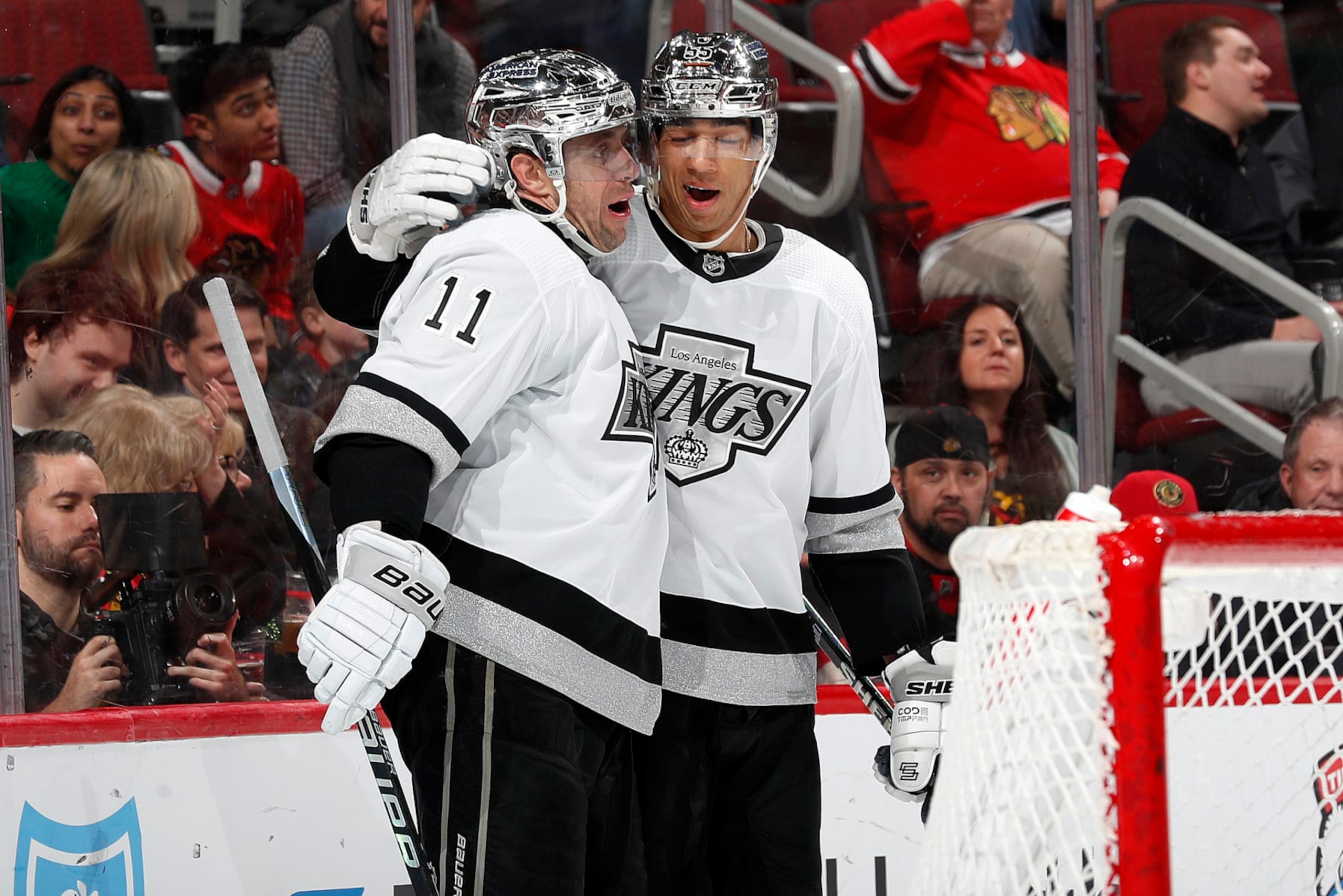 CHICAGO, ILLINOIS - MARCH 15: Anze Kopitar #11 of the Los Angeles Kings celebrates with Quinton Byfield #55 of the Los Angeles Kings after scoring against the Chicago Blackhawks during the first period at the United Center on March 15, 2024 in Chicago, Illinois. (Photo by Adam Eberhardt/NHLI via Getty Images)