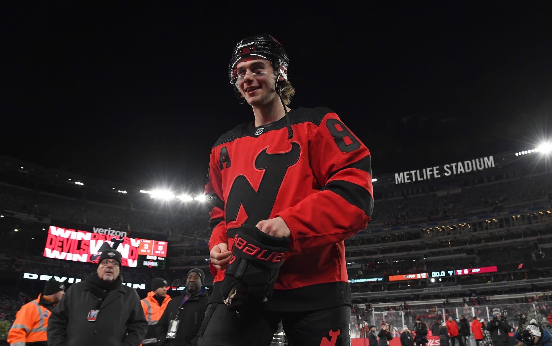 EAST RUTHERFORD, NEW JERSEY - FEBRUARY 17: Jack Hughes #86 of the New Jersey Devils makes his way back to the locker room after the 2024 Navy Federal Credit Union Stadium Series game between the Philadelphia Flyers and the New Jersey Devils at MetLife Stadium on February 17, 2024 in East Rutherford, New Jersey. The Devils defeated the Flyers 6-3. (Photo by Brian Babineau/NHLI via Getty Images)