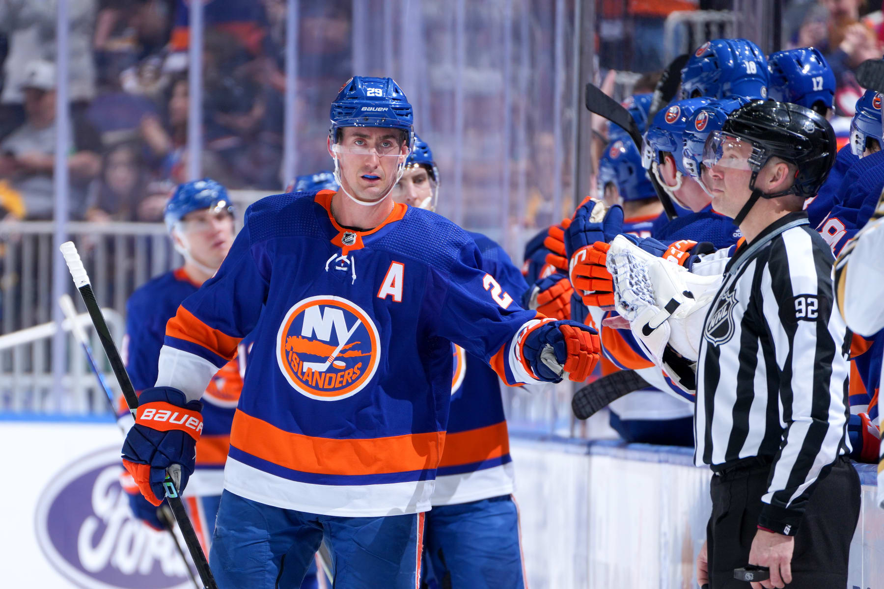ELMONT, NEW YORK - MARCH 02:  Brock Nelson #29 of the New York Islanders is congratulated by his teammates after scoring a goal against the Boston Bruins during the second period at UBS Arena on March 02, 2024 in Elmont, New York. (Photo by Mike Stobe/NHLI via Getty Images)