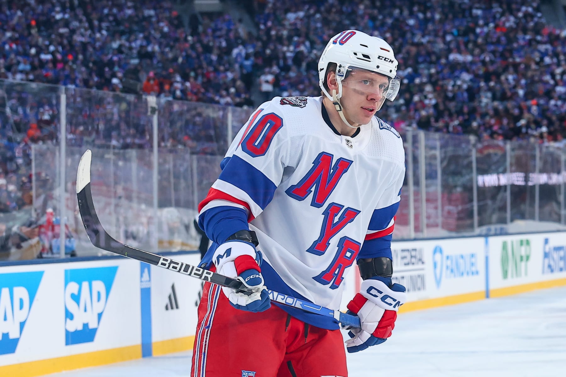 EAST RUTHERFORD, NJ - FEBRUARY 18:  Artemi Panarin #10 of the New York Rangers skates during the second period of the 2024 Navy Federal Credit Union Stadium Series game against the New York Islanders at MetLife Stadium on February 18 2024 in East Rutherford, New Jersey.  (Photo by Rich Graessle/Icon Sportswire via Getty Images)
