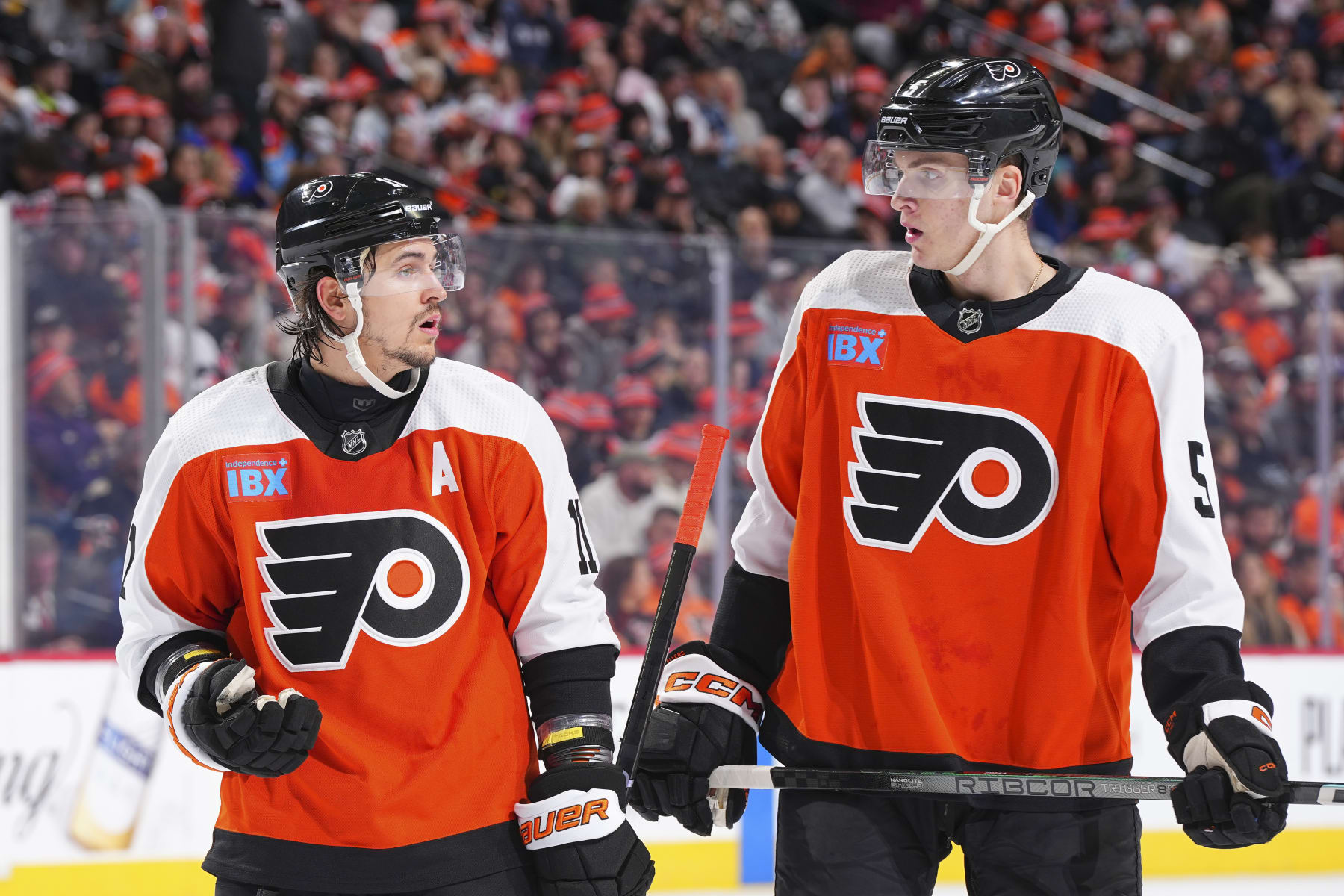 PHILADELPHIA, PENNSYLVANIA - MARCH 24: Travis Konecny #11 of the Philadelphia Flyers talks to Egor Zamula #5 against the Florida Panthers at the Wells Fargo Center on March 24, 2024 in Philadelphia, Pennsylvania. The Panthers defeated the Flyers 4-1. (Photo by Mitchell Leff/Getty Images)