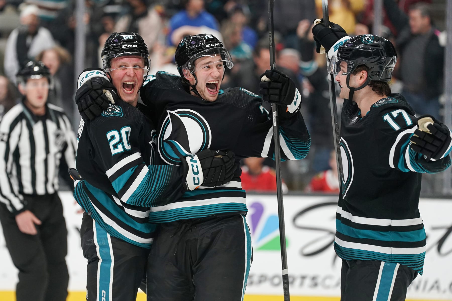 SAN JOSE, CA - MARCH 23: Fabian Zetterlund #20, William Eklund #72 and Thomas Bordeleau #17 of the San Jose Sharks celebrate scoring a goal in the second period against the Chicago Blackhawks at SAP Center on March 23, 2024 in San Jose, California. (Photo by Kavin Mistry/NHLI via Getty Images)