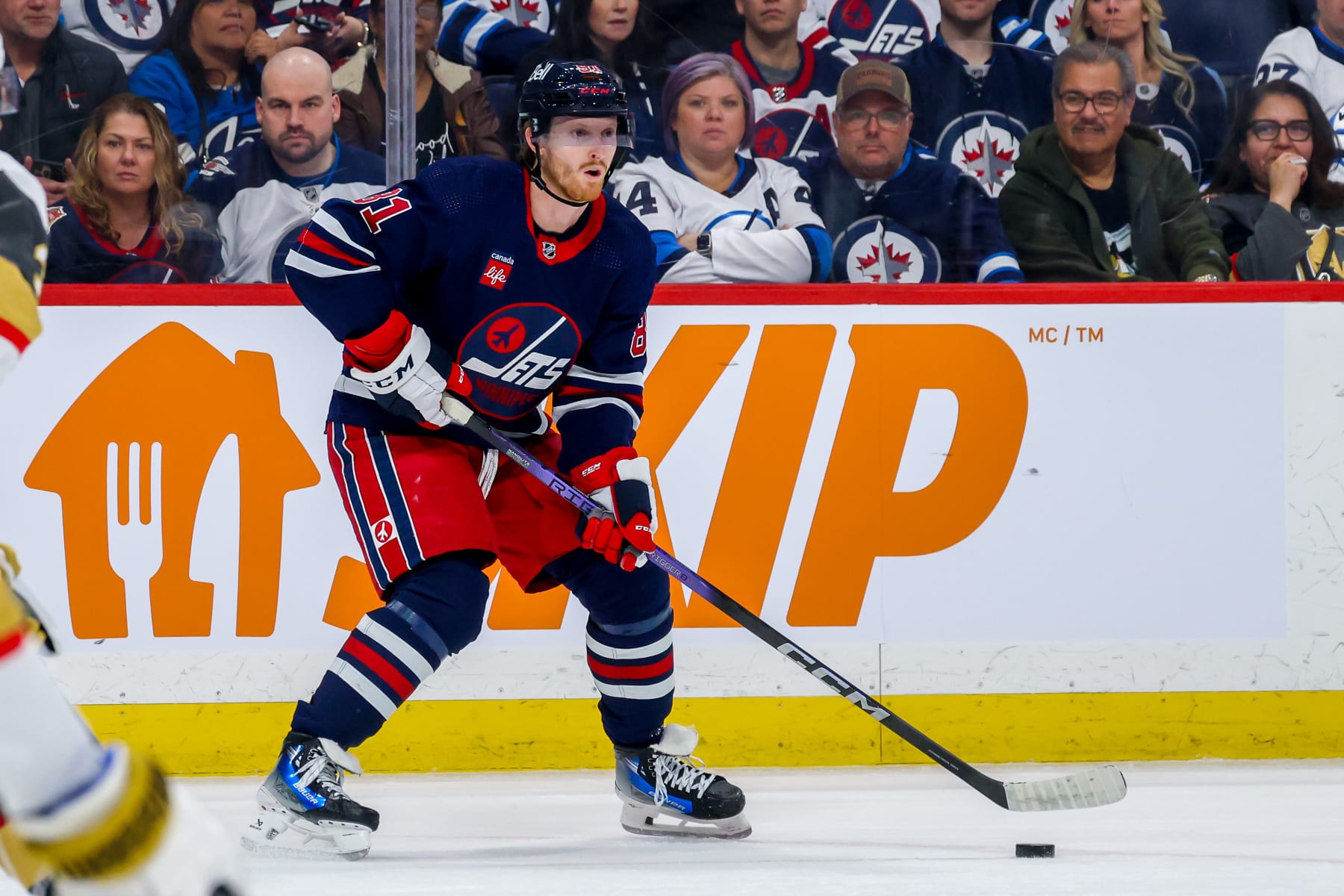 WINNIPEG, CANADA - MARCH 28: Kyle Connor #81 of the Winnipeg Jets plays the puck during second period action against the Vegas Golden Knights at Canada Life Centre on March 28, 2024 in Winnipeg, Manitoba, Canada. (Photo by Jonathan Kozub/NHLI via Getty Images)