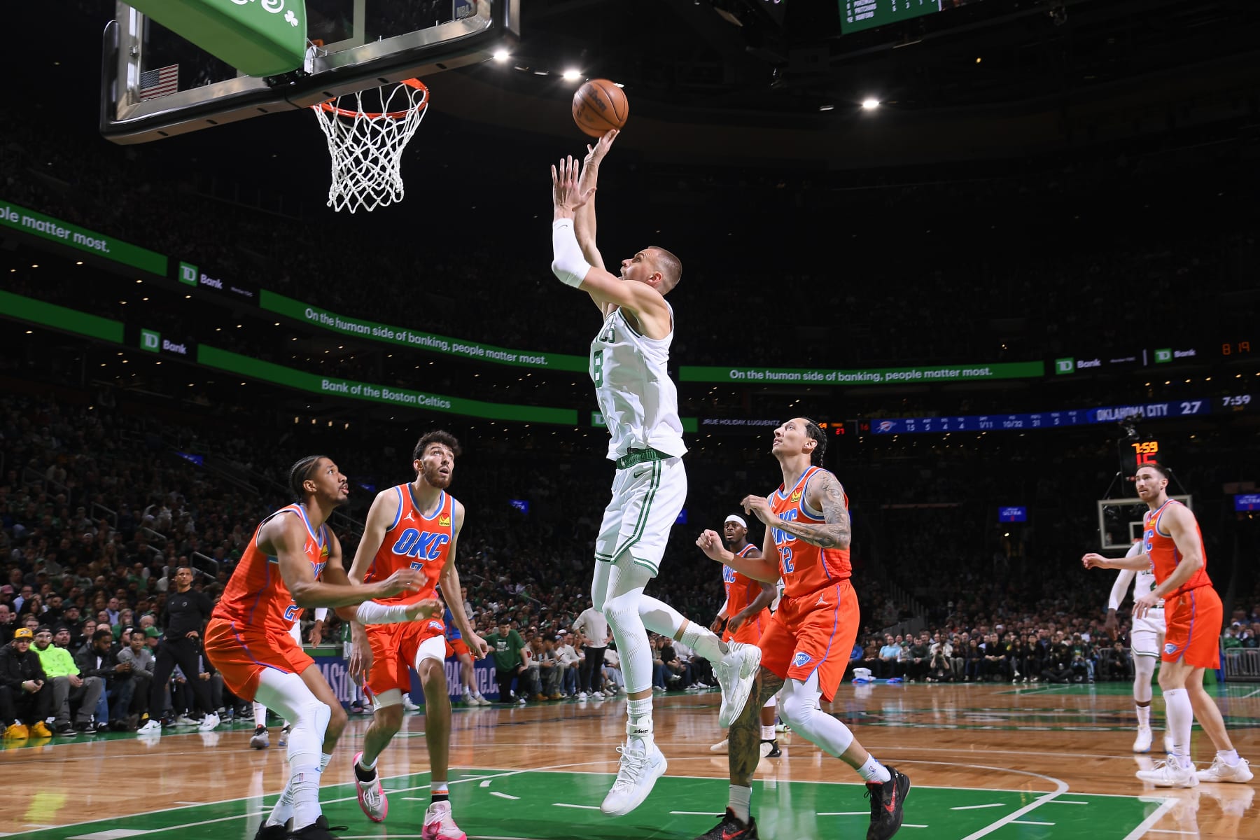 BOSTON, MA - APRIL 3: Kristaps Porzingis #8 of the Boston Celtics drives to the basket during the game against the Oklahoma City Thunder on April 3, 2024 at the TD Garden in Boston, Massachusetts. NOTE TO USER: User expressly acknowledges and agrees that, by downloading and or using this photograph, User is consenting to the terms and conditions of the Getty Images License Agreement. Mandatory Copyright Notice: Copyright 2024 NBAE  (Photo by Brian Babineau/NBAE via Getty Images)