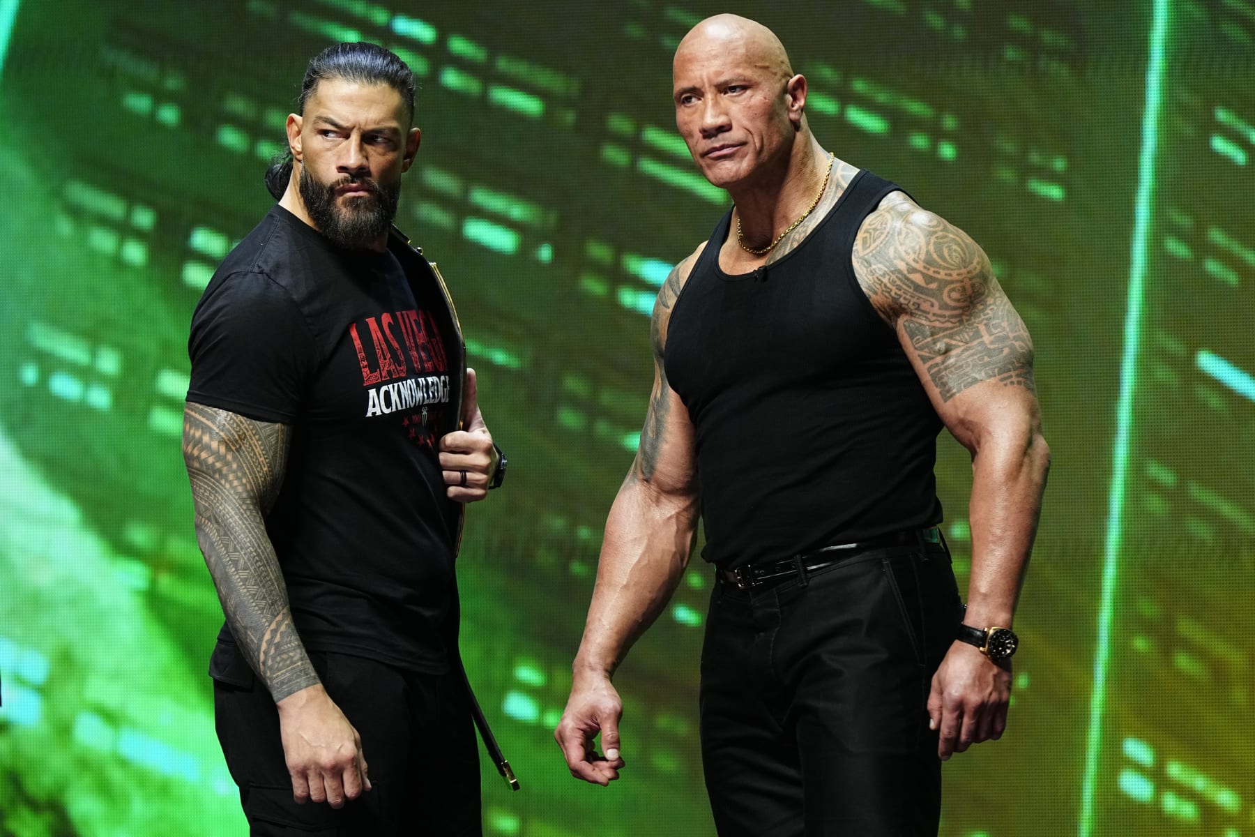 LAS VEGAS, NV - FEBRUARY 08:  Dwayne "The Rock" Johnson and Roman Reigns during the WWE Wrestlemania XL Kickoff on February 08, 2024, at T-Mobile Arena in Las Vegas, NV. (Photo by Louis Grasse/PXimages/Icon Sportswire via Getty Images)