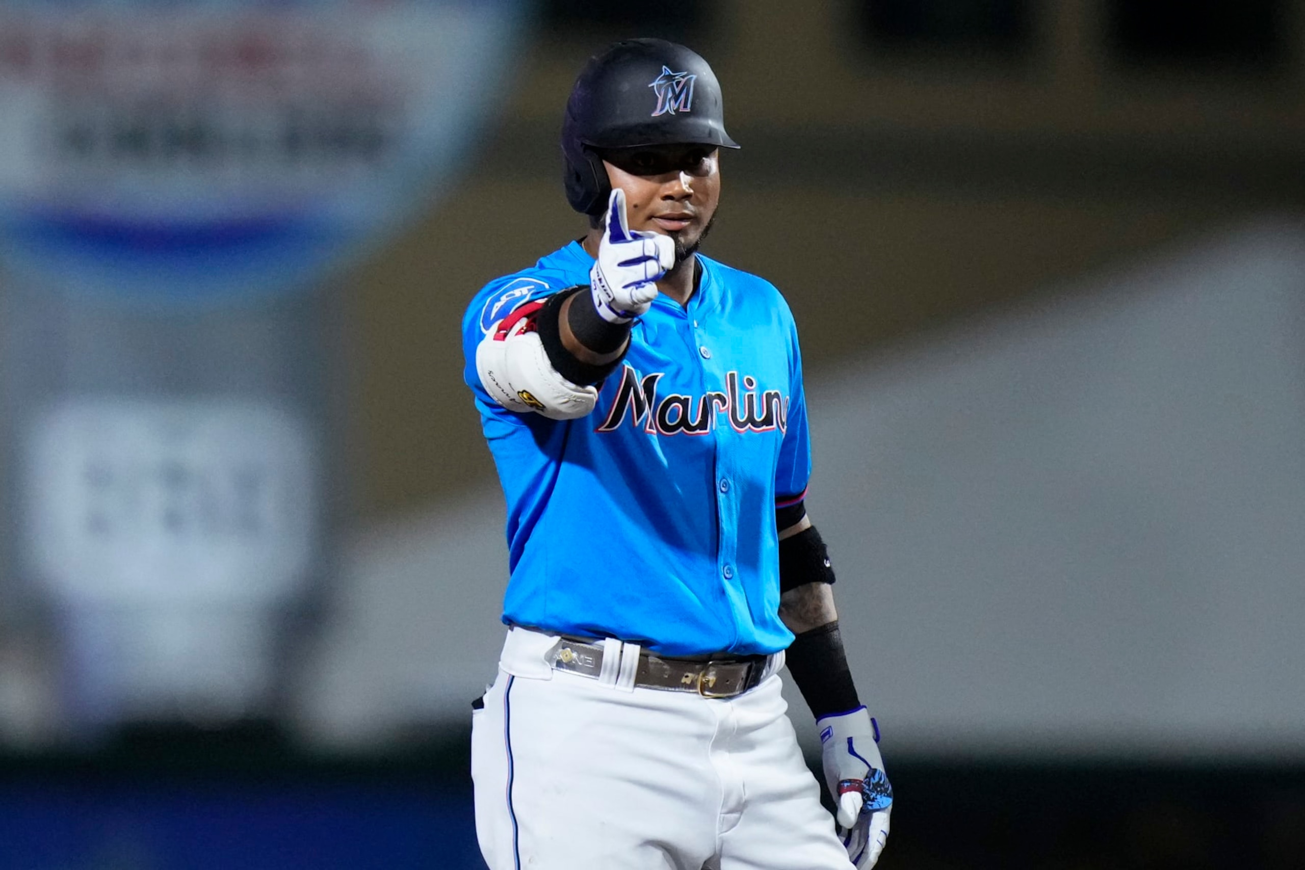 JUPITER, FLORIDA - MARCH 08: Luis Arraez #3 of the Miami Marlins celebrates hitting a double against the New York Mets during the first inning of a spring training game at Roger Dean Stadium on March 08, 2024 in Jupiter, Florida. (Photo by Rich Storry/Getty Images) JUPITER, FLORIDA - MARCH 08: Luis Arraez #3 of the Miami Marlins celebrates hitting a double against the New York Mets during the first inning of a spring training game at Roger Dean Stadium on March 08, 2024 in Jupiter, Florida. (Photo by Rich Storry/Getty Images)