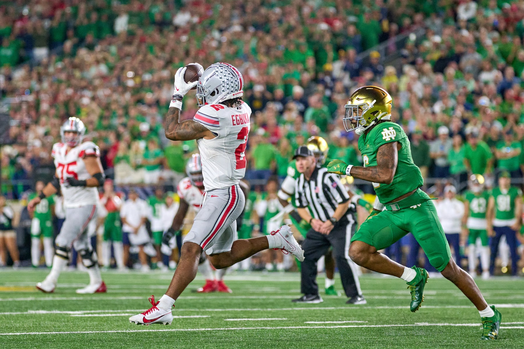 SOUTH BEND, IN - SEPTEMBER 23: Ohio State Buckeyes wide receiver Emeka Egbuka (2) catches the football in action during a football game between the Notre Dame Fighting Irish and the Ohio State Buckeyes on September 23, 2023 at Notre Dame Stadium in South Bend, IN. (Photo by Robin Alam/Icon Sportswire via Getty Images)