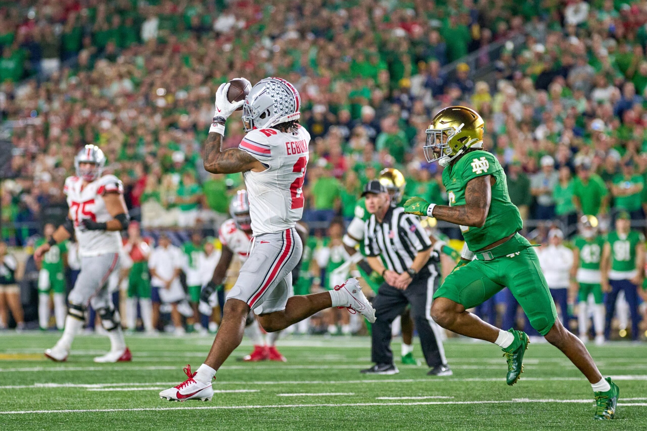 SOUTH BEND, IN - SEPTEMBER 23: Ohio State Buckeyes wide receiver Emeka Egbuka (2) catches the football in action during a football game between the Notre Dame Fighting Irish and the Ohio State Buckeyes on September 23, 2023 at Notre Dame Stadium in South Bend, IN. (Photo by Robin Alam/Icon Sportswire via Getty Images)