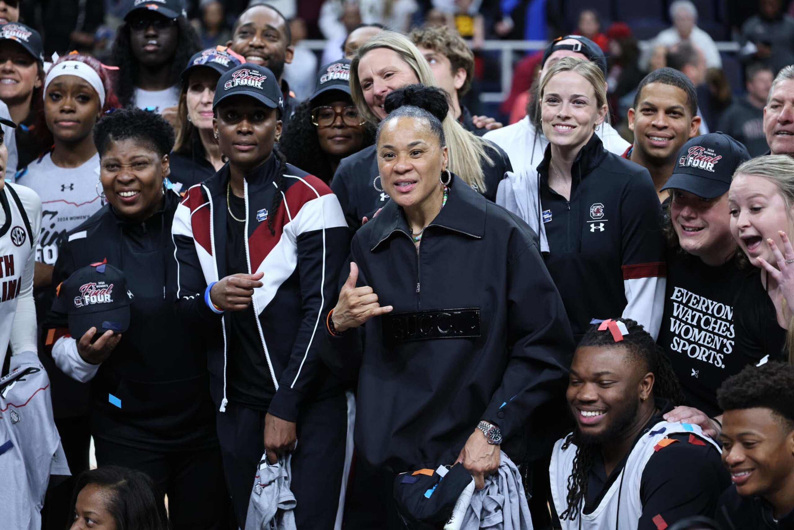ALBANY, NEW YORK - MARCH 31: Head coach Dawn Staley of the South Carolina Gamecocks celebrates with the team after beating the Oregon State Beavers in the Elite 8 round of the NCAA Women's Basketball Tournament at MVP Arena on March 31, 2024 in Albany, New York. (Photo by Andy Lyons/Getty Images)