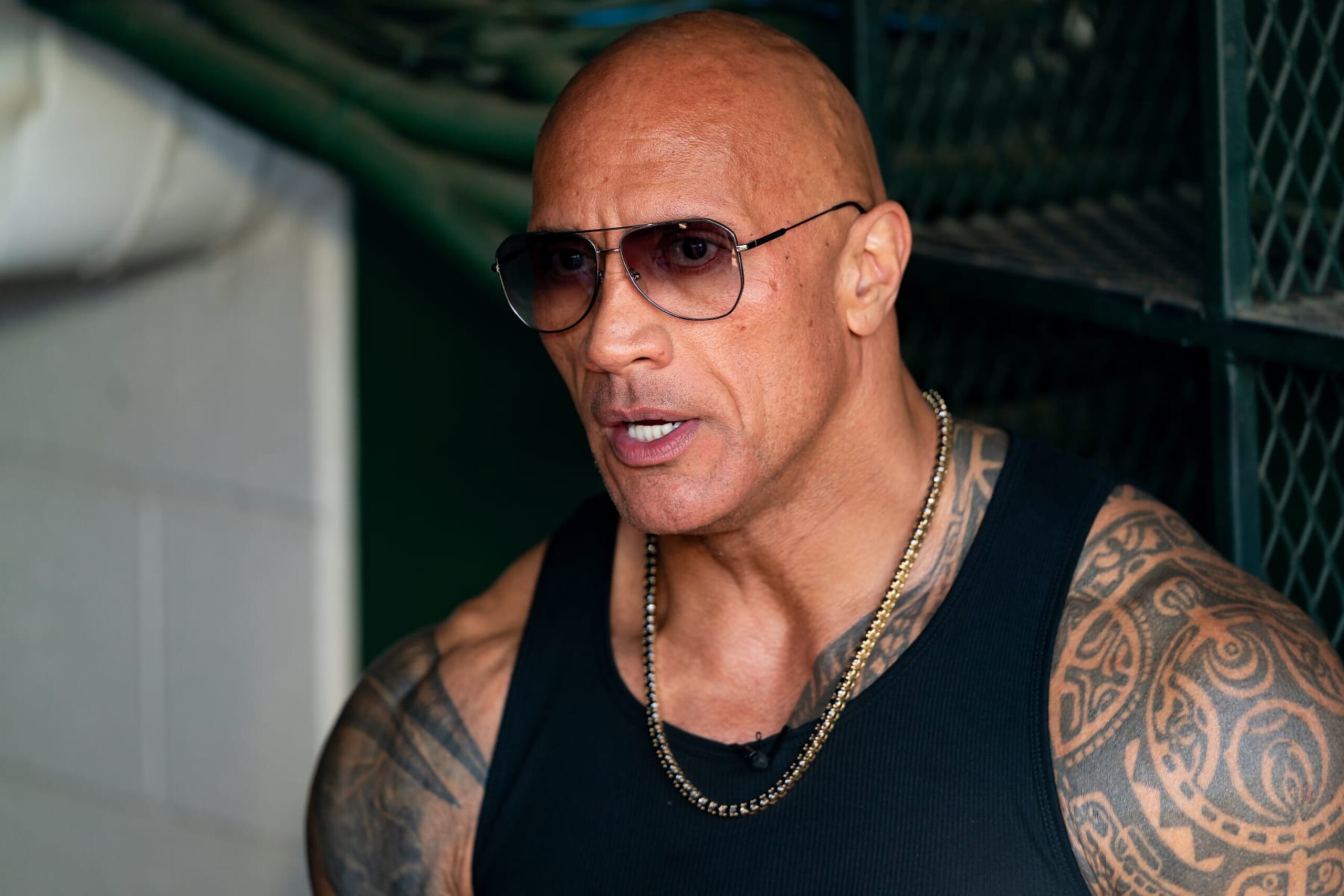 ARLINGTON, TX - MARCH 30: UFL Owner Dwayne Johnson (The Rock) talks with fans during a UFL game between the Birmingham Stallions and the Arlington Renegades on March 30, 2024 at Choctaw Stadium in Arlington, TX. (Photo by Chris Leduc/Icon Sportswire via Getty Images)