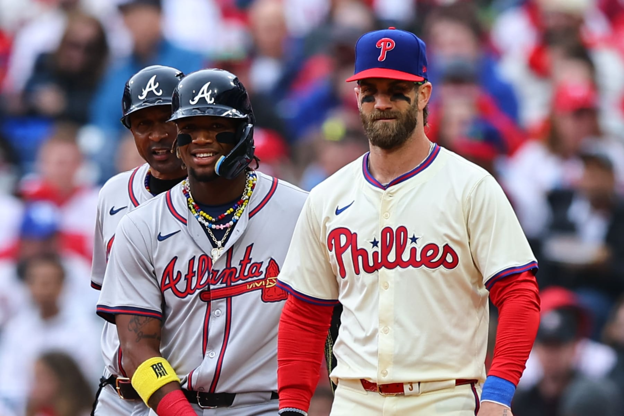 PHILADELPHIA, PA - MARCH 30: Bryce Harper (3) of the Philadelphia Phillies talks with Ronald Acuña Jr. (13) of the Atlanta Braves during the game on March 30, 2024 at Citizens Bank Park in Philadelphia, Pennsylvania. (Photo by Rich Graessle/Icon Sportswire via Getty Images) PHILADELPHIA, PA - MARCH 30: Bryce Harper (3) of the Philadelphia Phillies talks with Ronald Acuña Jr. (13) of the Atlanta Braves during the game on March 30, 2024 at Citizens Bank Park in Philadelphia, Pennsylvania. (Photo by Rich Graessle/Icon Sportswire via Getty Images)