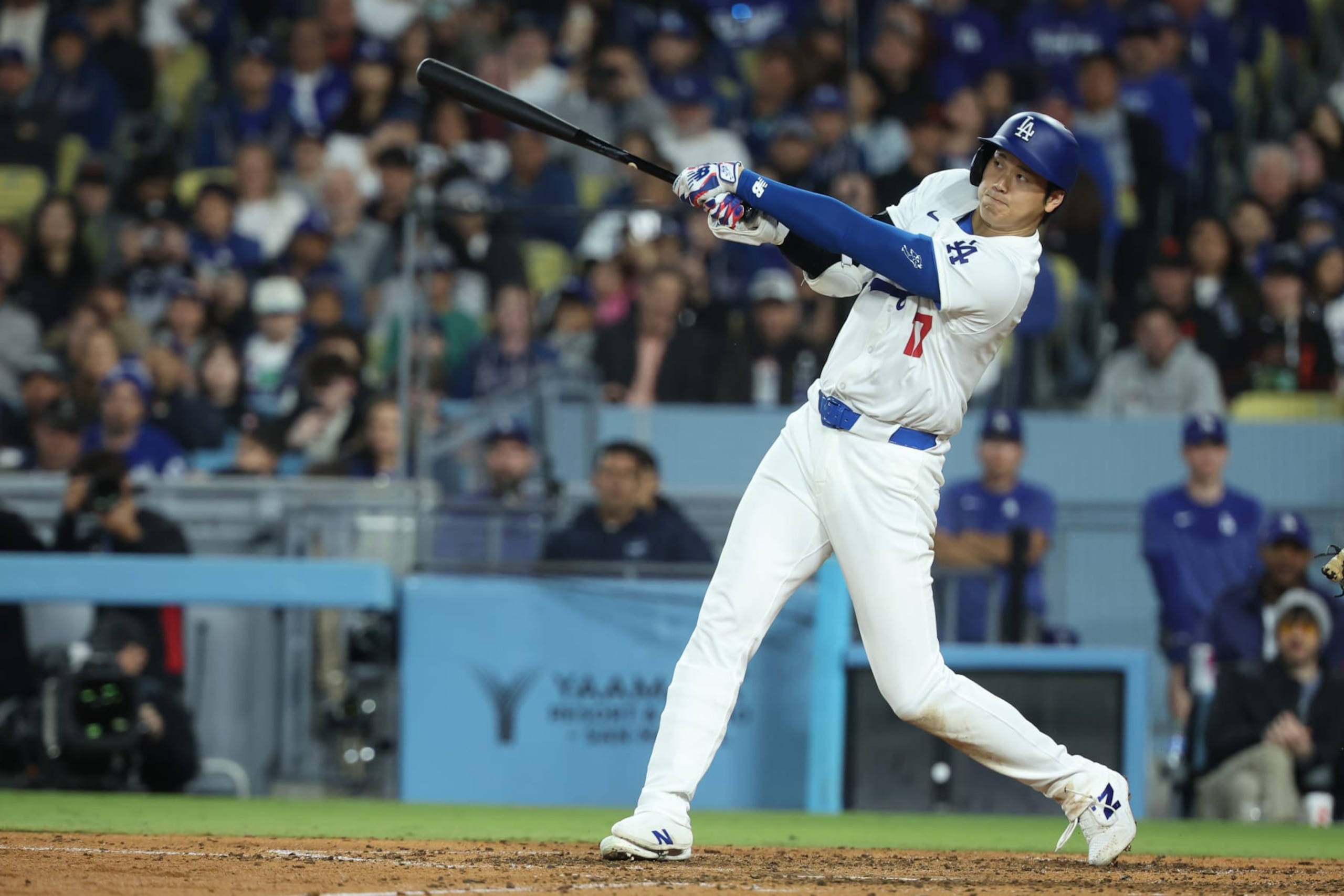 LOS ANGELES, CA - APRIL 03: Los Angeles Dodgers designated hitter Shohei Ohtani (17) homers in the seventh inning during the game between the San Francisco Giants and the Los Angeles Dodgers on Wednesday, April 3, 2024 at Dodger Stadium, Los Angeles, CA. (Photo by Peter Joneleit/Icon Sportswire via Getty Images)