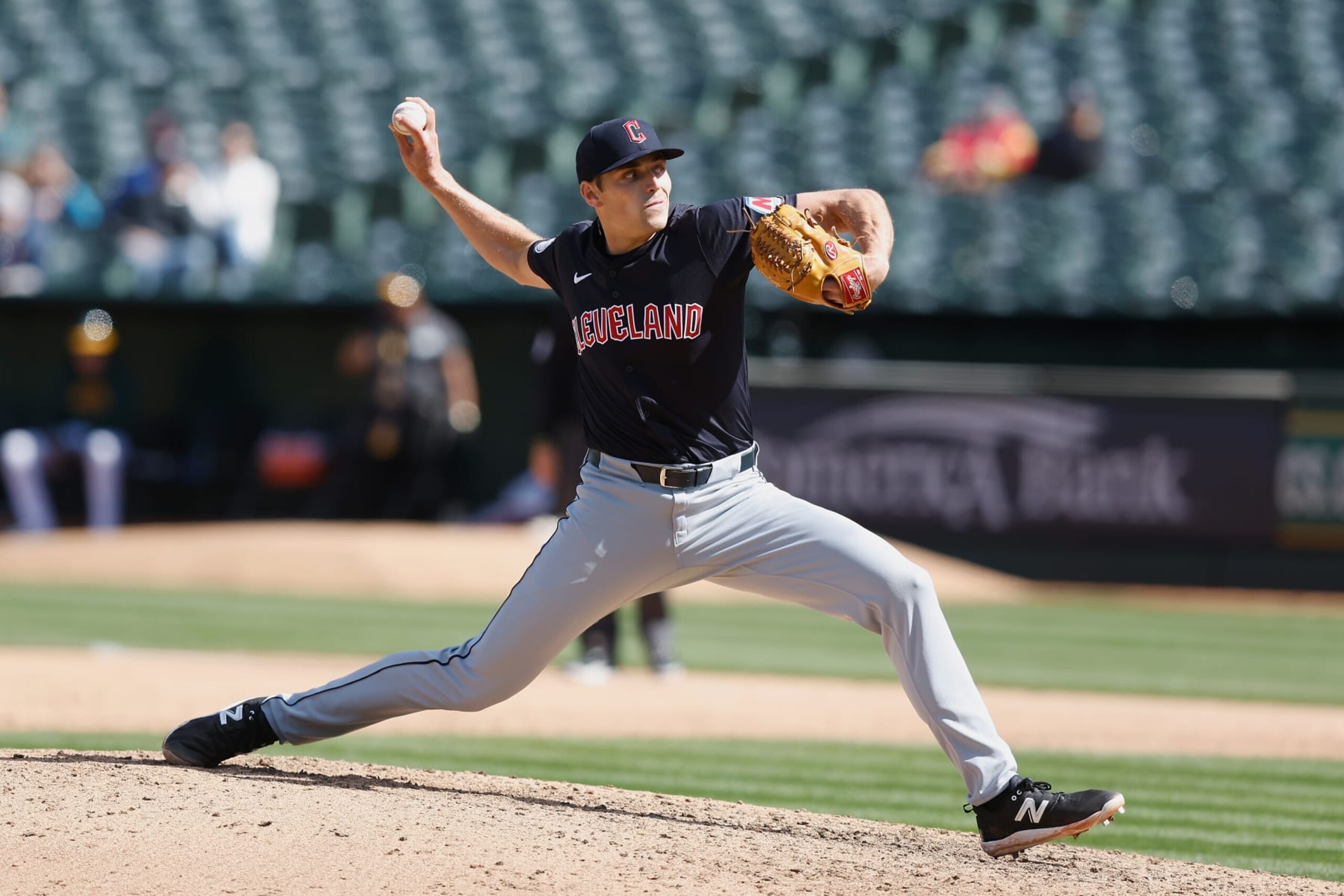 OAKLAND, CALIFORNIA - MARCH 30: Cade Smith #36 of the Cleveland Guardians pitches in the bottom of the sixth inning against the Oakland Athletics at Oakland Coliseum on March 30, 2024 in Oakland, California. This was Smith's Major League debut. (Photo by Lachlan Cunningham/Getty Images)