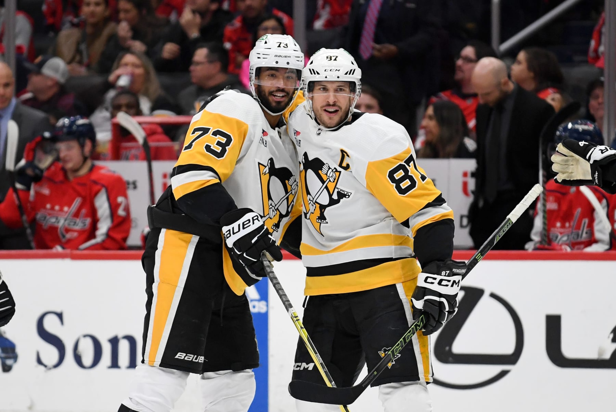 WASHINGTON, DC - APRIL 04: Penguins defenseman Pierre-Olivier Joseph (73) and center Sidney Crosby (87) celebrate after Joseph's first period goal during the Pittsburgh Penguins versus Washington Capitals National Hockey League game on April 4, 2024 at Capital One Arena in Washington, D.C.. (Photo by Randy Litzinger/Icon Sportswire via Getty Images) WASHINGTON, DC - APRIL 04: Penguins defenseman Pierre-Olivier Joseph (73) and center Sidney Crosby (87) celebrate after Joseph's first period goal during the Pittsburgh Penguins versus Washington Capitals National Hockey League game on April 4, 2024 at Capital One Arena in Washington, D.C.. (Photo by Randy Litzinger/Icon Sportswire via Getty Images)