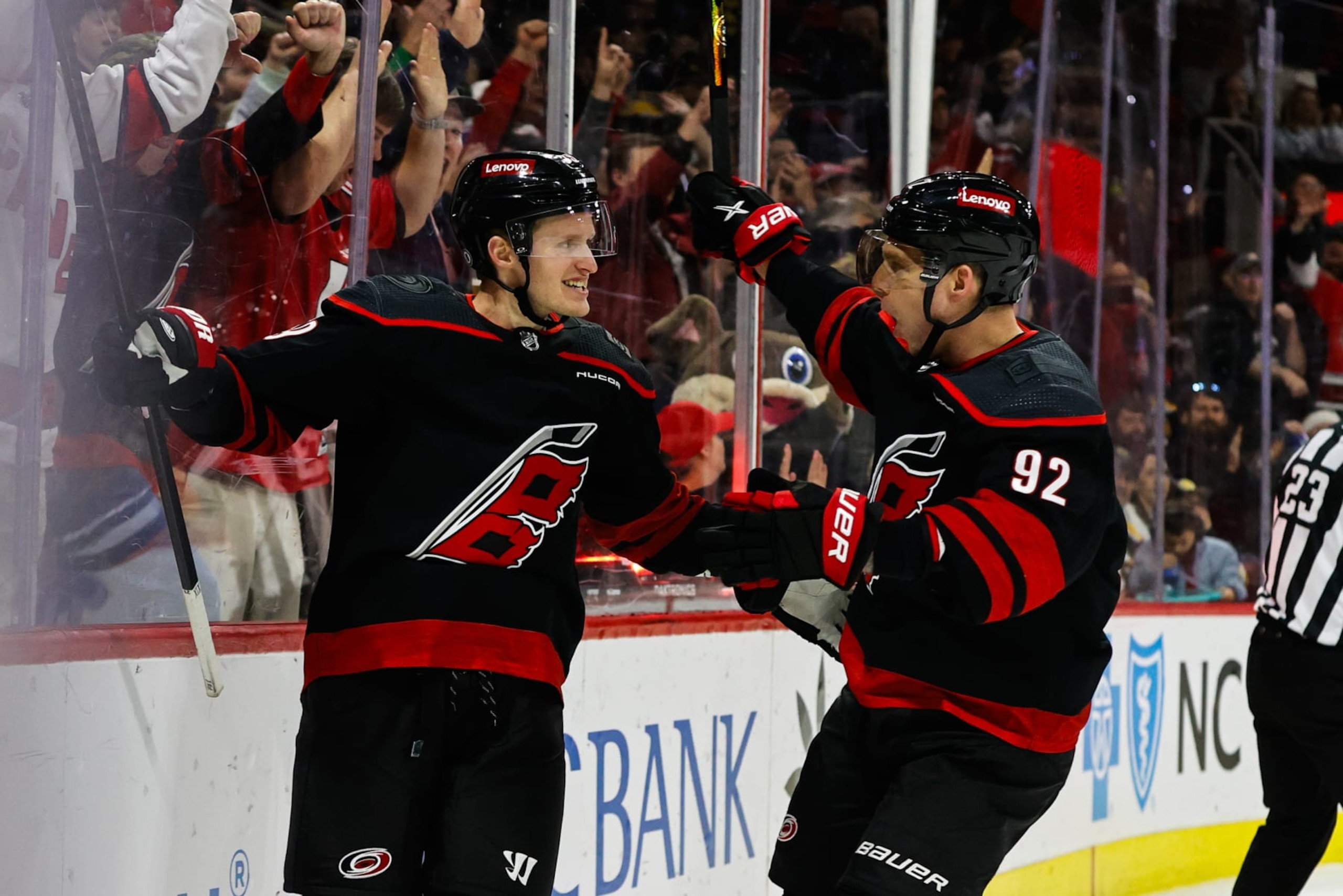 RALEIGH, NC - APRIL 04: Jake Guentzel #59 of the Carolina Hurricanes celebrates his goal with Evgeny Kuznetsov #92 during the second period against the Boston Bruins at PNC Arena on April 04, 2024 in Raleigh, North Carolina. (Photo by Jaylynn Nash/Getty Images) RALEIGH, NC - APRIL 04: Jake Guentzel #59 of the Carolina Hurricanes celebrates his goal with Evgeny Kuznetsov #92 during the second period against the Boston Bruins at PNC Arena on April 04, 2024 in Raleigh, North Carolina. (Photo by Jaylynn Nash/Getty Images)