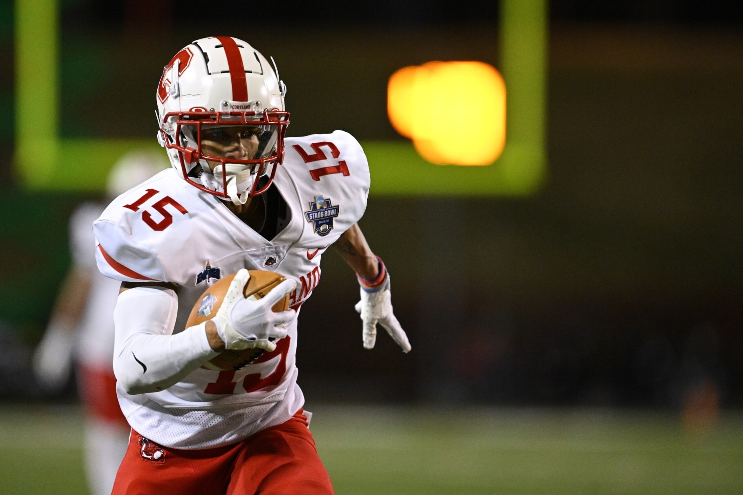 SALEM, VIRGINIA - DECEMBER 15: Cole Burgess #15 of the Cortland Red Dragons makes a catch against the North Central Cardinals during the Division III Football Championship held at Salem Stadium on December 15, 2023 in Salem, Virginia. Cortland won 38-37. (Photo by Grant Halverson/NCAA Photos via Getty Images) SALEM, VIRGINIA - DECEMBER 15: Cole Burgess #15 of the Cortland Red Dragons makes a catch against the North Central Cardinals during the Division III Football Championship held at Salem Stadium on December 15, 2023 in Salem, Virginia. Cortland won 38-37. (Photo by Grant Halverson/NCAA Photos via Getty Images)