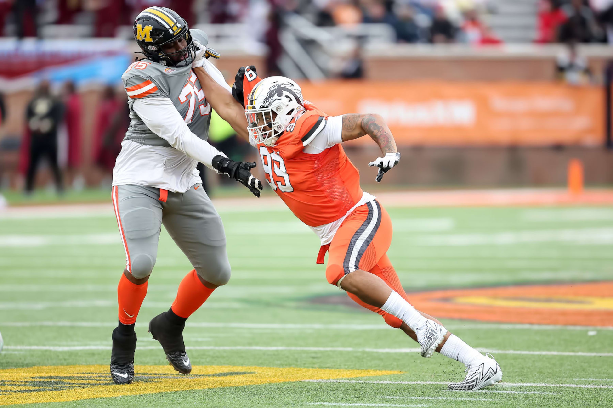 MOBILE, AL - FEBRUARY 03: National edge Marshawn Kneeland of Western Michigan (99) fights off the block from American offensive lineman Javon Foster of Missouri (75) during the the 2024 Reese's Senior Bowl on February 3, 2024 at Hancock Whitney Stadium in Mobile, Alabama. (Photo by Michael Wade/Icon Sportswire via Getty Images) MOBILE, AL - FEBRUARY 03: National edge Marshawn Kneeland of Western Michigan (99) fights off the block from American offensive lineman Javon Foster of Missouri (75) during the the 2024 Reese's Senior Bowl on February 3, 2024 at Hancock Whitney Stadium in Mobile, Alabama. (Photo by Michael Wade/Icon Sportswire via Getty Images)