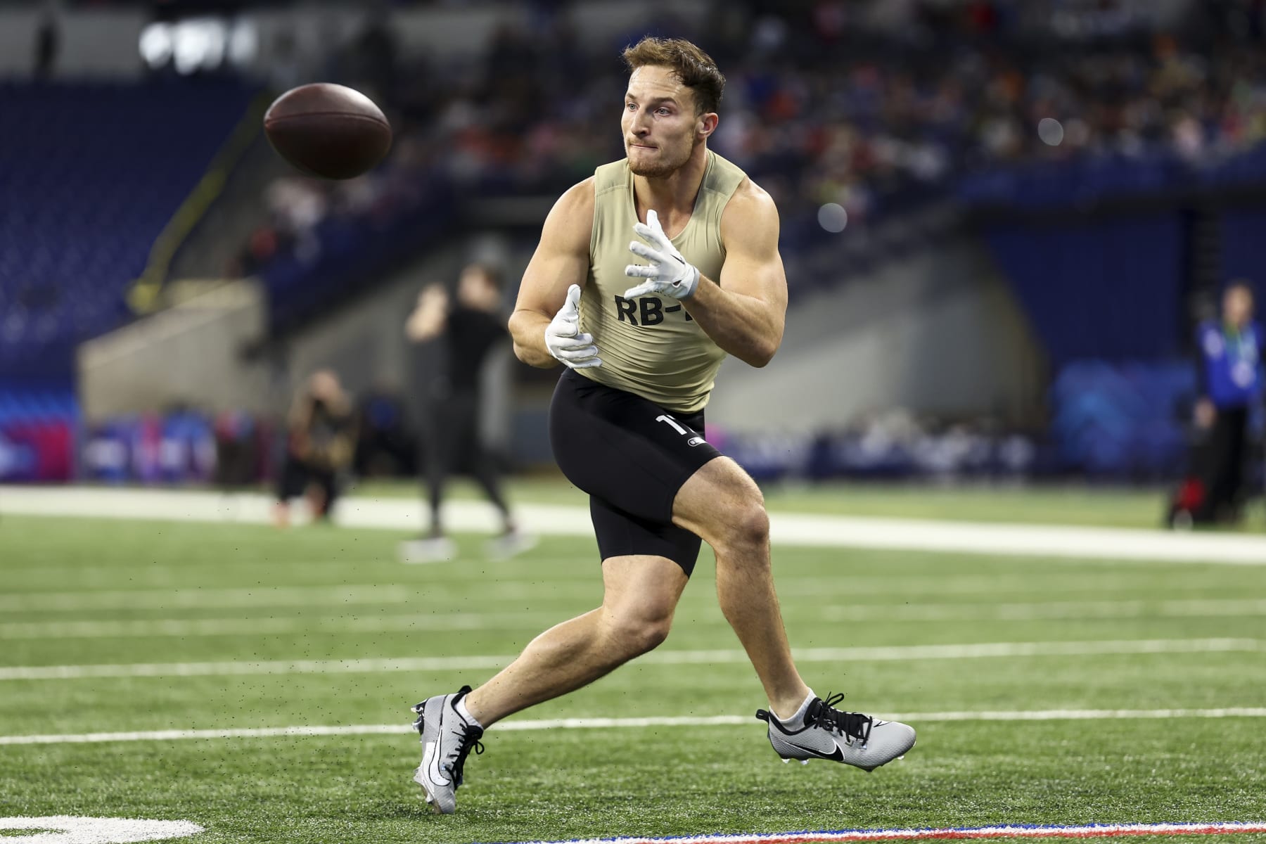 INDIANAPOLIS, INDIANA - MARCH 2: Dylan Laube #RB17 of New Hampshire participates in a drill during the NFL Combine at the Lucas Oil Stadium on March 2, 2024 in Indianapolis, Indiana. (Photo by Kevin Sabitus/Getty Images)