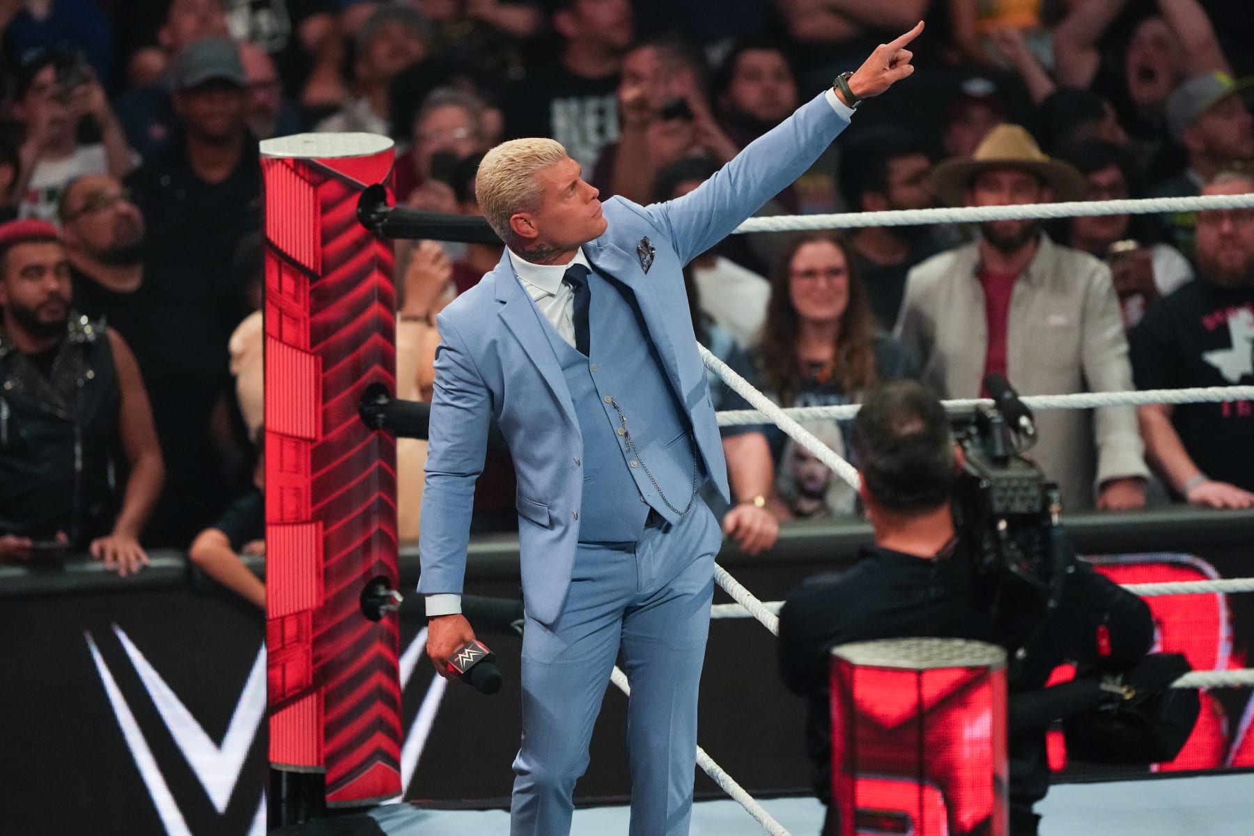 HOUSTON, TEXAS - MARCH 11: Cody Rhodes points to the Wrestlemania banner during WWE Monday Night RAW at Toyota Center on March 11, 2024 in Houston, Texas. (Photo by Alex Bierens de Haan/Getty Images)