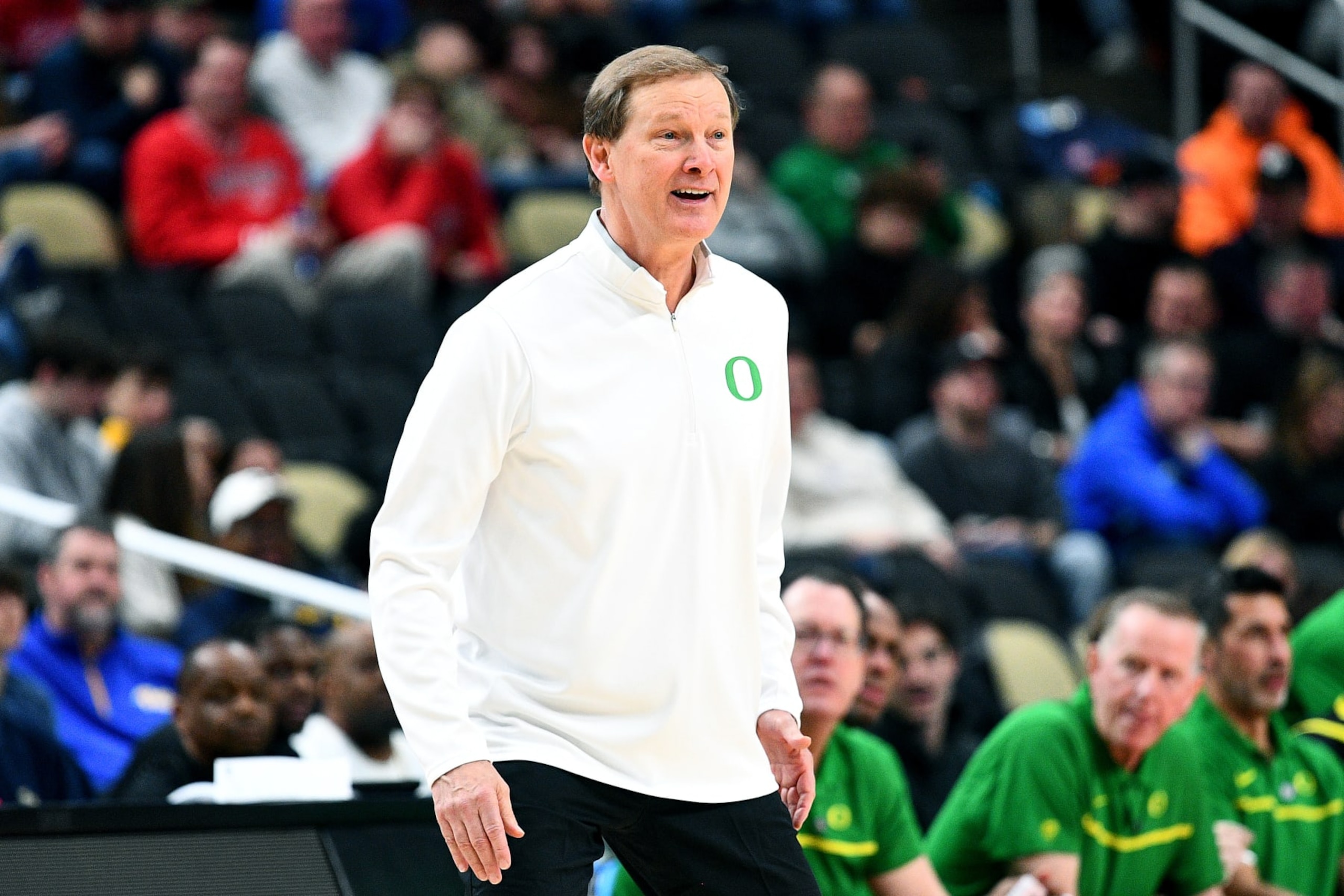 PITTSBURGH, PENNSYLVANIA - MARCH 23: Head coach Dana Altman of the Oregon Ducks looks on during the second half of a game against the Creighton Bluejays in the second round of the NCAA Men's Basketball Tournament at PPG PAINTS Arena on March 23, 2024 in Pittsburgh, Pennsylvania. (Photo by Joe Sargent/Getty Images)
