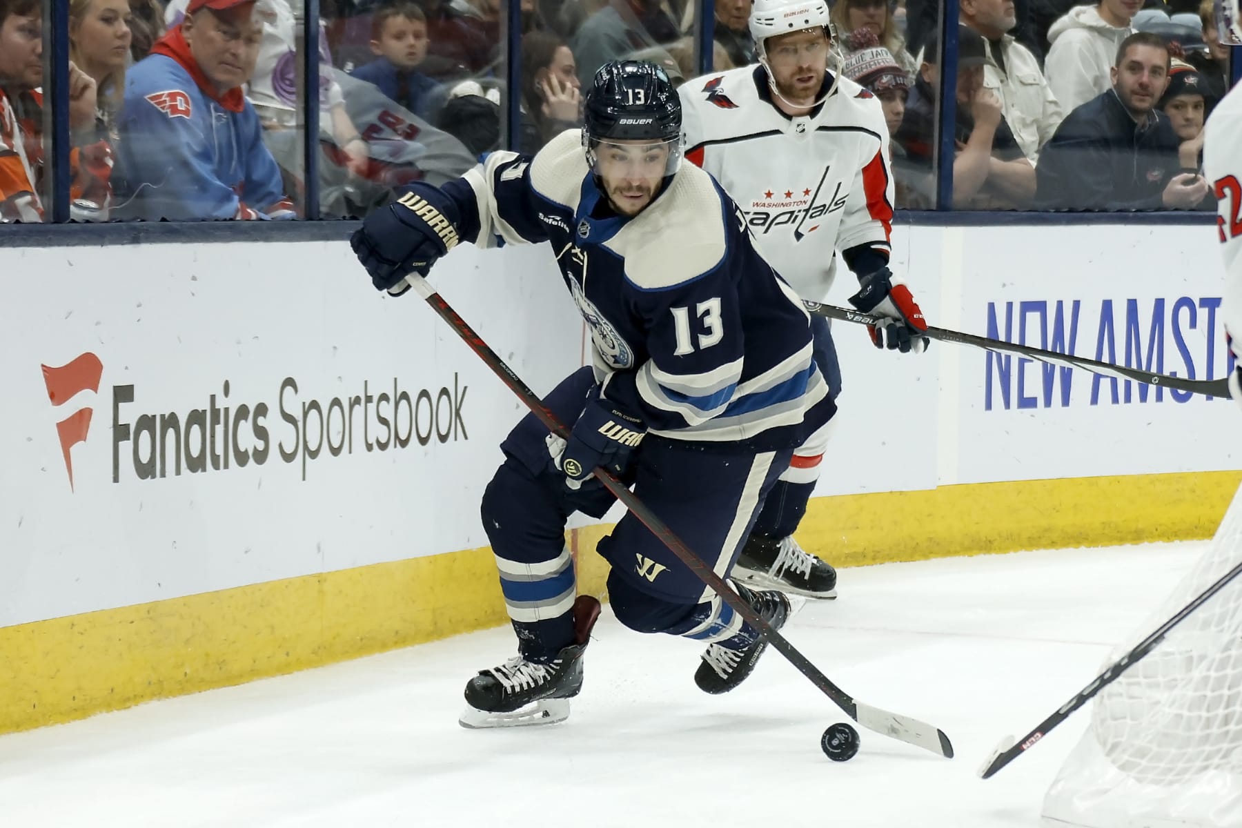 COLUMBUS, OHIO - DECEMBER 21:  Johnny Gaudreau #13 of the Columbus Blue Jackets controls the puck during the game against the Washington Capitals at Nationwide Arena on December 21, 2023 in Columbus, Ohio. (Photo by Kirk Irwin/Getty Images)