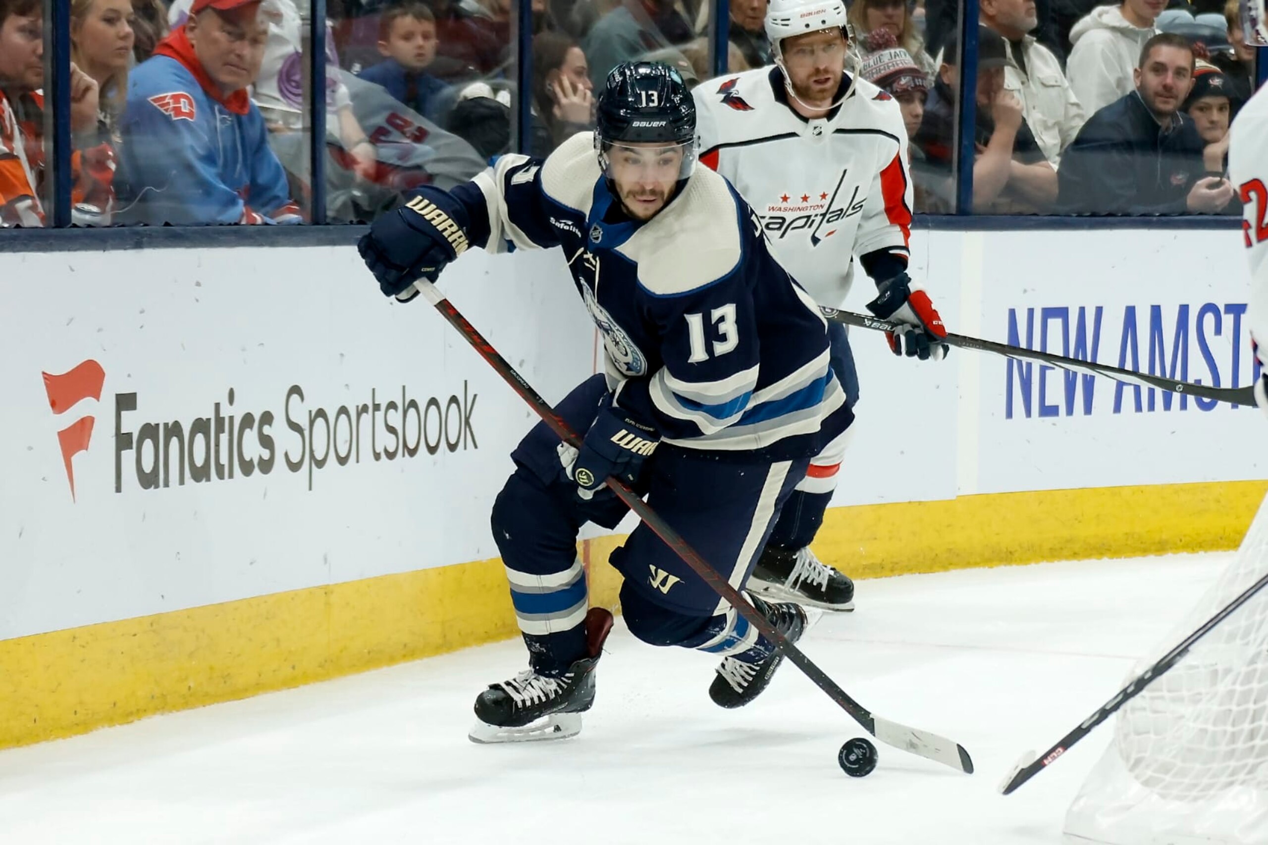 COLUMBUS, OHIO - DECEMBER 21:  Johnny Gaudreau #13 of the Columbus Blue Jackets controls the puck during the game against the Washington Capitals at Nationwide Arena on December 21, 2023 in Columbus, Ohio. (Photo by Kirk Irwin/Getty Images)