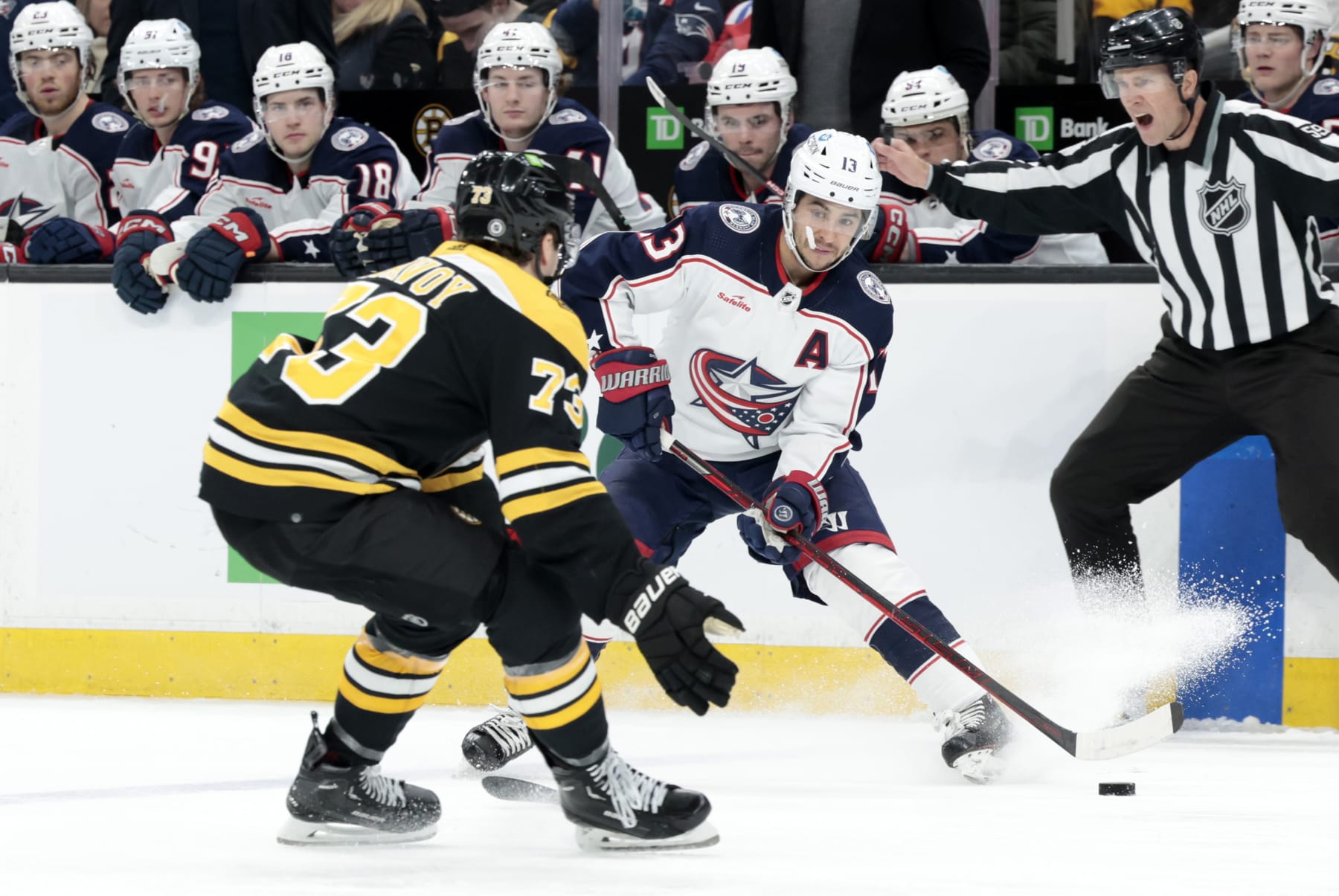 BOSTON, MA - MARCH 30: Columbus Blue Jackets left wing Johnny Gaudreau (13) takes not of Boston Bruins right defenseman Charlie McAvoy (73) during a game between the Boston Bruins and the Columbus Blue Jackets on March 30, 2023, at TD Garden in Boston, Massachusetts. (Photo by Fred Kfoury III/Icon Sportswire via Getty Images)